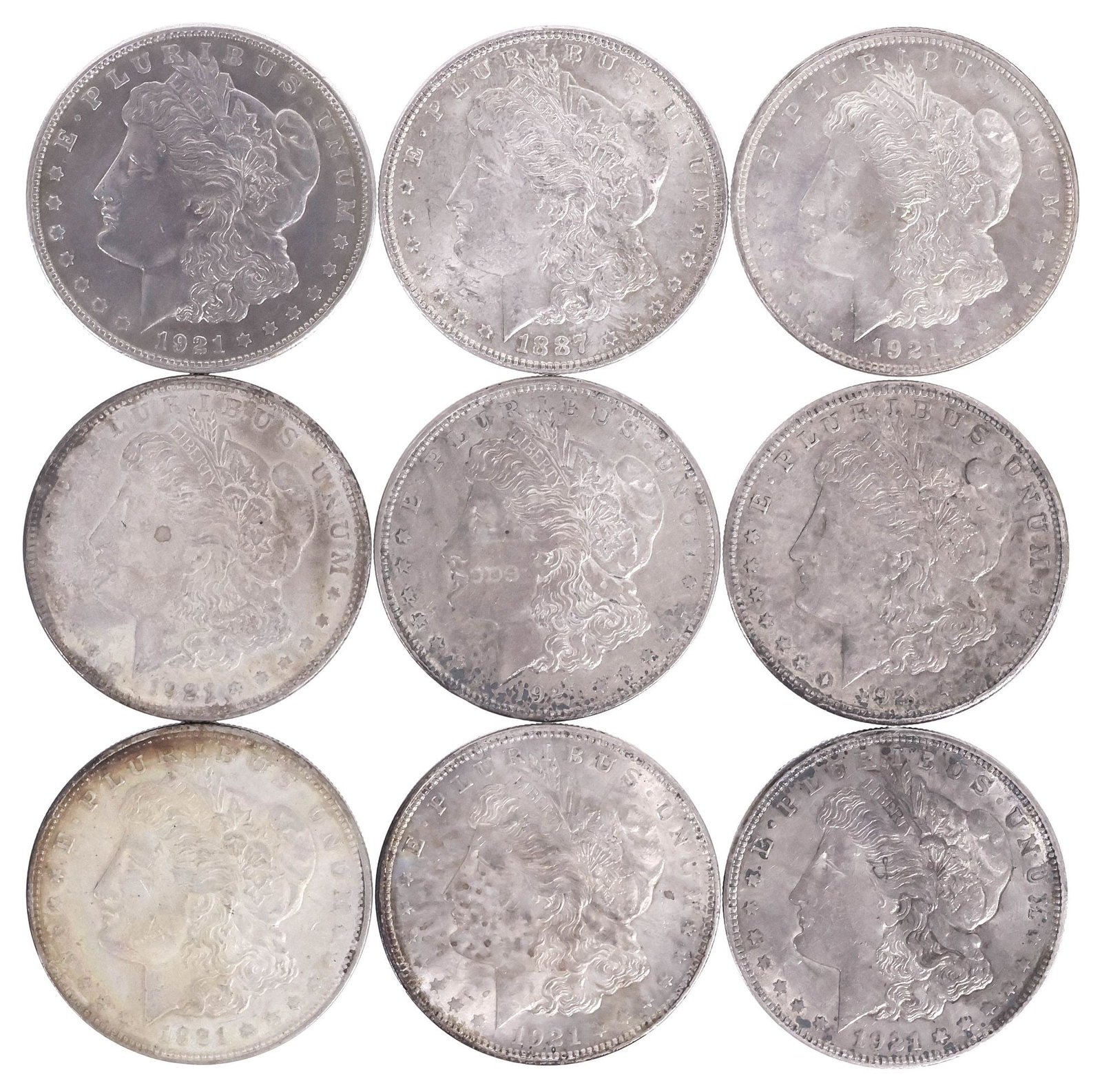 (9) U.S. MORGAN SILVER DOLLARS: (lot of 10) U.S. Morgan Silver Dollars: (1) 1887-P; (5) 1921-P; (3) 1921-D **NOTE: ALL JEWELRY & COIN LOTS REALIZING OVER $1,000 MUST BE PAID BY BANK WIRE**