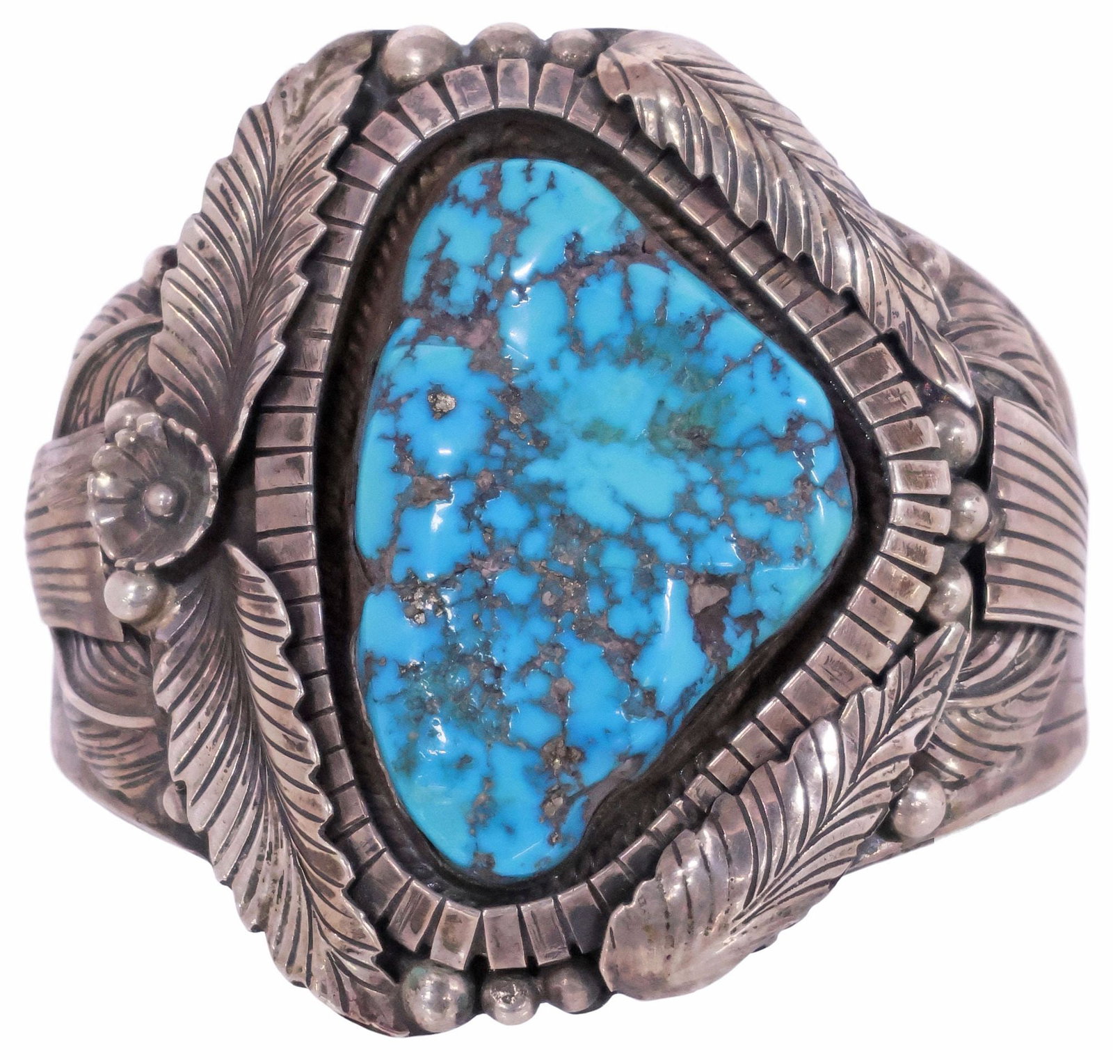 IMPRESSIVE SIGNED NATIVE AMERICAN SILVER & TURQUOISE CUFF BRACELET: Large Native American silver (content unknown) cuff bracelet, with large bezel-set turquoise cabochon, squash blossom foliates and blooms, on split shank, signed S. Silver (sterling silver), ?Wilfered