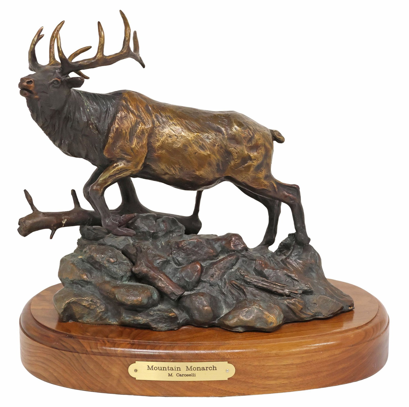 MARIANNE CAROSELLI (B.1941) BRONZE STAG SCULPTURE, 'MOUNTAIN MONARCH': Patinated bronze sculpture, "Mountain Monarch," signed in cast M. Caroselli (Marianne Caroselli, Texas, b.1941), dated 1998, numbered 5/ 40, on wood base, retaining title plaque, overall: approx 12"h,