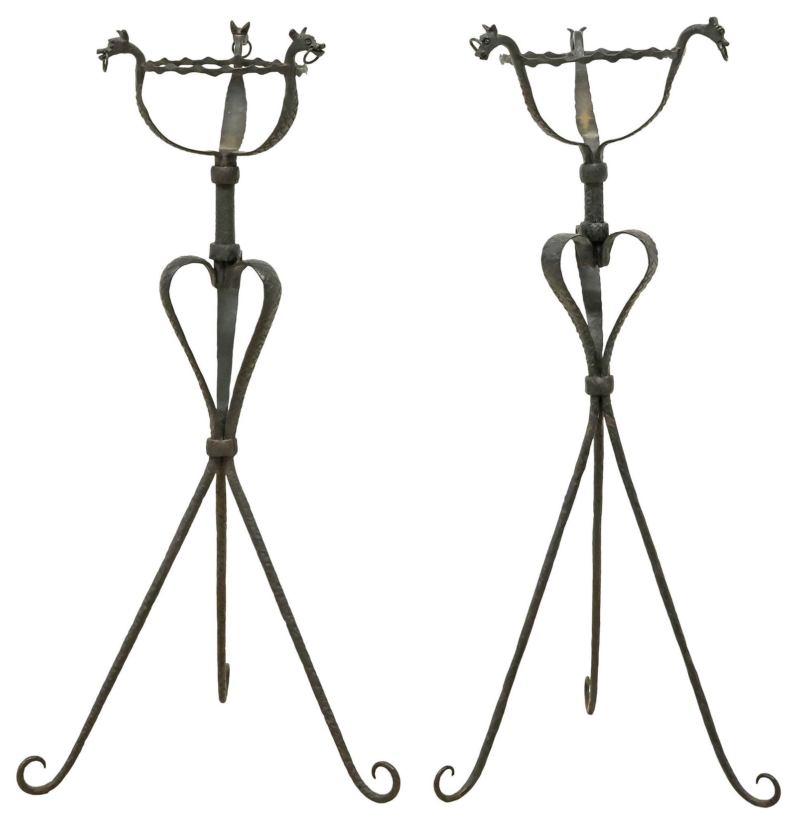 (2) MANNER OF ANTONIO GAUDI WROUGHT IRON PLANTER STANDS: (pair) Wrought iron planter stands, in the manner of Antonio Gaudi (Spanish, 1852-1926), early 20th c., circular crimped basin frame with dragon mask terminals, rising on tripodal base with cast