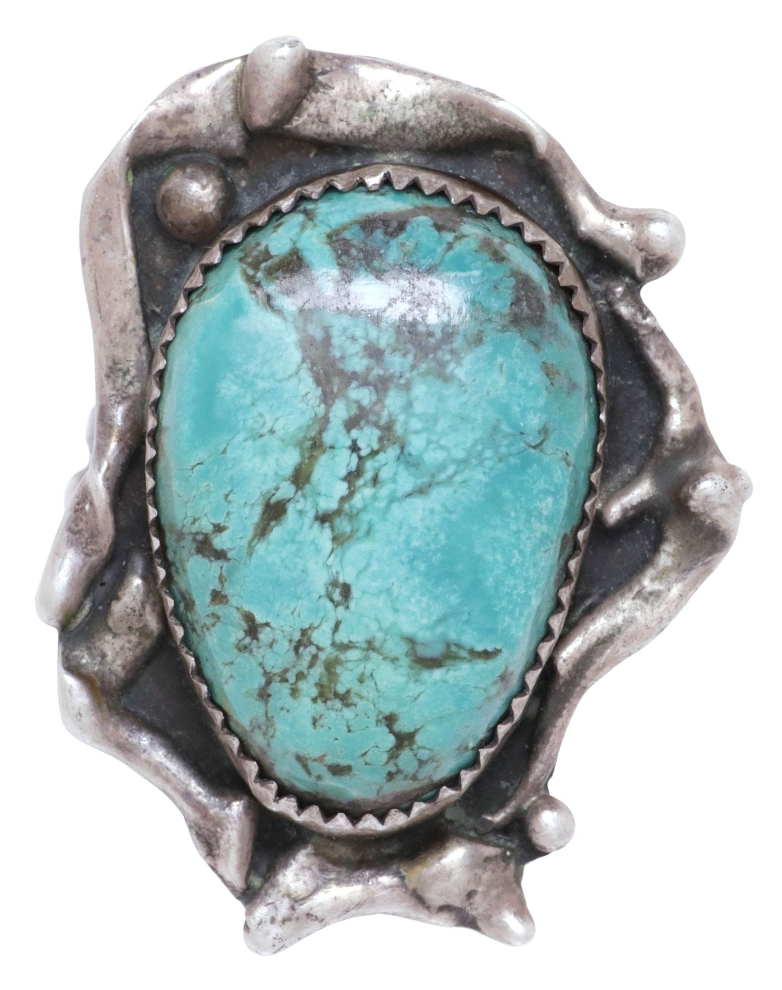 NATIVE AMERICAN SILVER & TURQUOISE CABOCHON GENT'S RING, SIGNED KT: Large Native American silver (content unknown) gent's ring, bezel-set turquoise cabochon in naturalistic freeform surround, signed KT with heart-shaped picto mark, plaque: approx 1 5/8"l, 1.25"w, appr