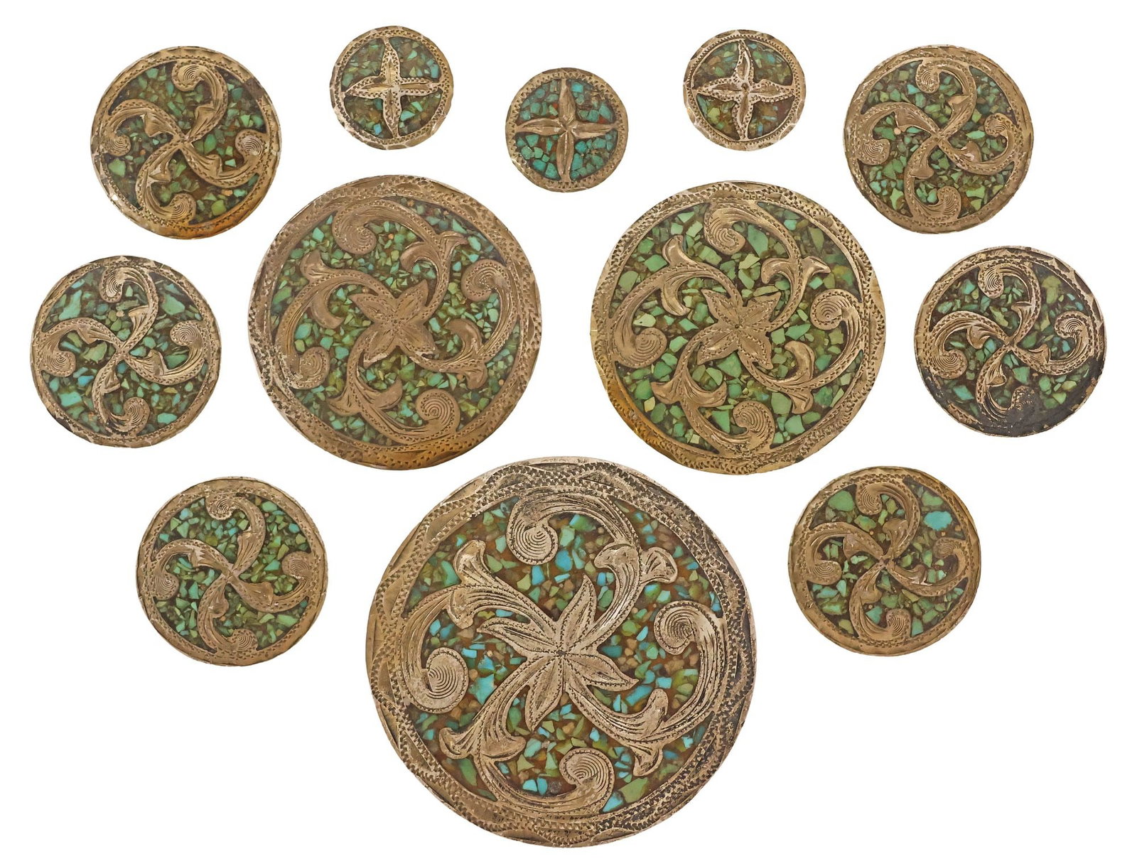 (12) VICTOR MOSES BEGAY (ATTRIB.) NAVAJO STERLING & TURQUOISE CHIP CONCHOS: (lot of 12) Native American sterling silver, turquoise, and amazonite chip inlaid conchos, attributed to Victor Moses Begay (Navajo/ Dine, 20th c.), each with stampwork motifs and scrolling foliates, 