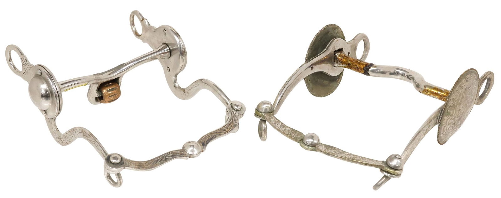 (2) HORSE SHOW BITS, ONE WITH 3" CONCHOS: (lot of 2) Horse Bits: (1) Silver Overlay 7.75" foliate engraved cheekpiece with a 3" concho at each side, a curb mouthpiece, the engraved slobber bar marked at the underside "PB",