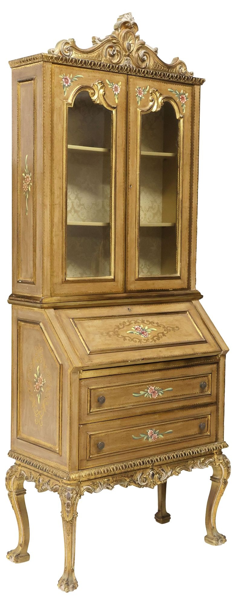 ITALIAN FLORENTINE PARCEL-GILT & PAINTED SECRETARY BOOKCASE: Italian Florentine parcel-gilt and paint-decorated secretary bookcase, early 20th c., having scrolled foliate crest, above dual glazed cabinet doors, revealing upholstered interior and fixed-height sh