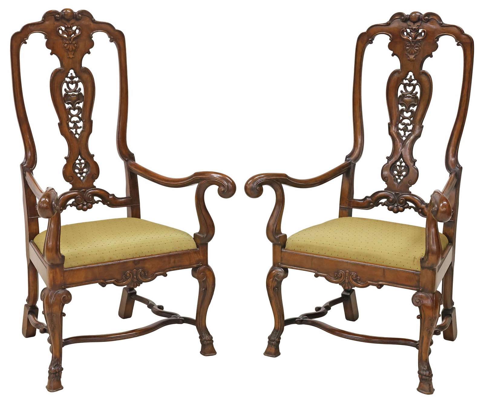 (2) ENGLISH CARVED & UPHOLSTERED ARMCHAIRS ON HOOF FEET: (pair) English carved wood armchairs, early 20th c., each having openwork splat, upholstered seat framed by scrolled arms, rising on cabriole legs joined by shaped H stretcher, ending on hoof feet, la