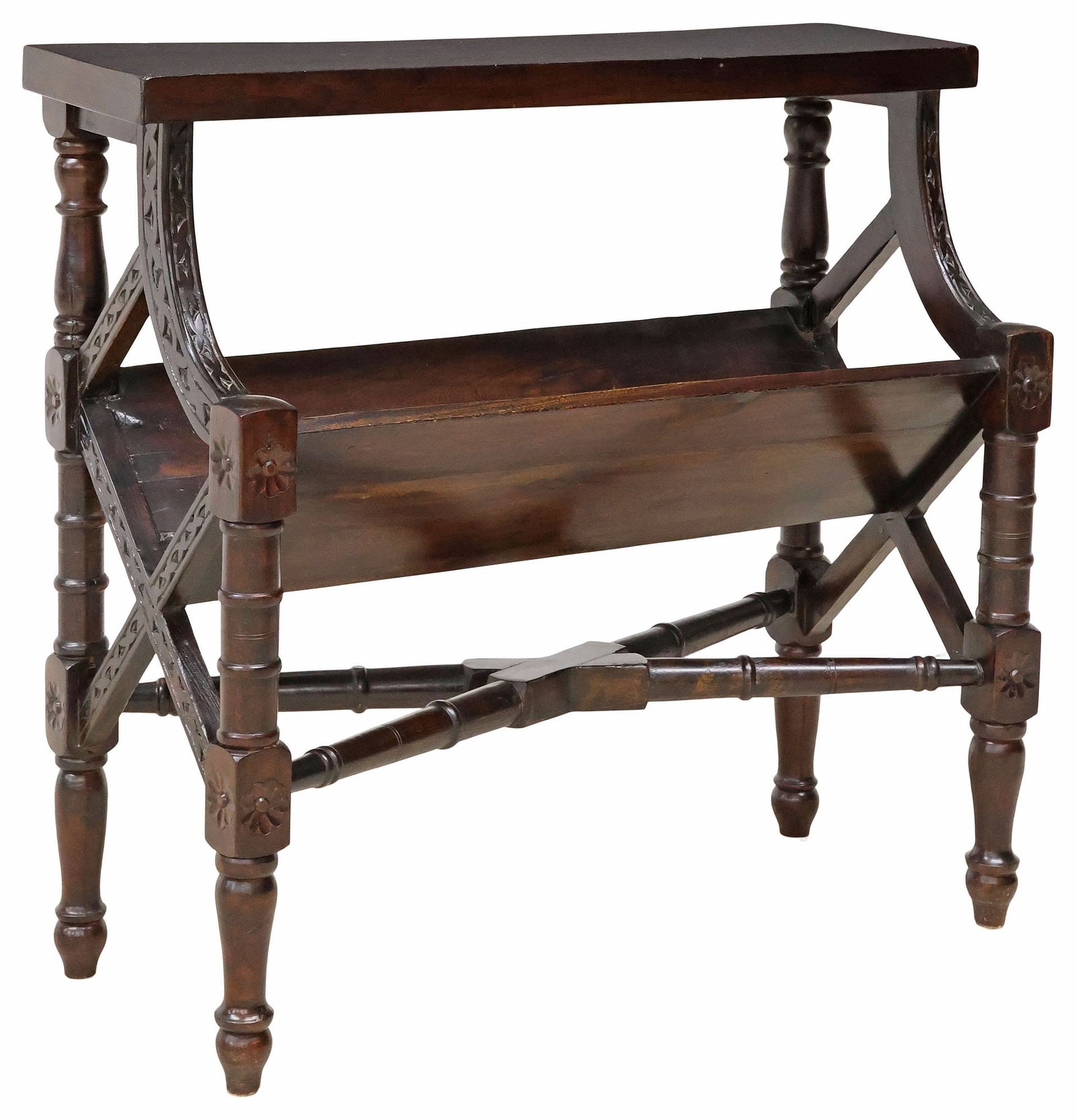 CHIPPENDALE STYLE MOHAGANY LIBRARY BOOK TROUGH: Chippendale style mahogany library book trough, 20th c., having rectangular top over canted book trough, with openwork sides and carved floral motifs, legs joined by cross stretcher, ending on tapered