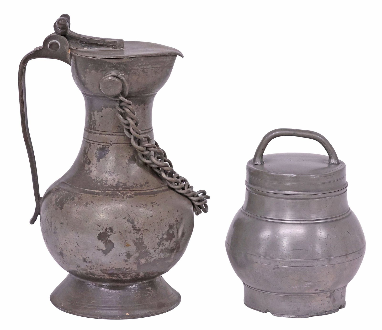 (2) CONTINENTAL PEWTER VESSELS, POT-A-BOULLION & BAUCHKANNE / TANKARD: (lot of 2) Continental pewter tableware, including: (1) bauchkanne/ tankard, with acorn finials, over heart-shaped lid, fluted neck, equipped with chain-link handle, rising on flared base, touch marks