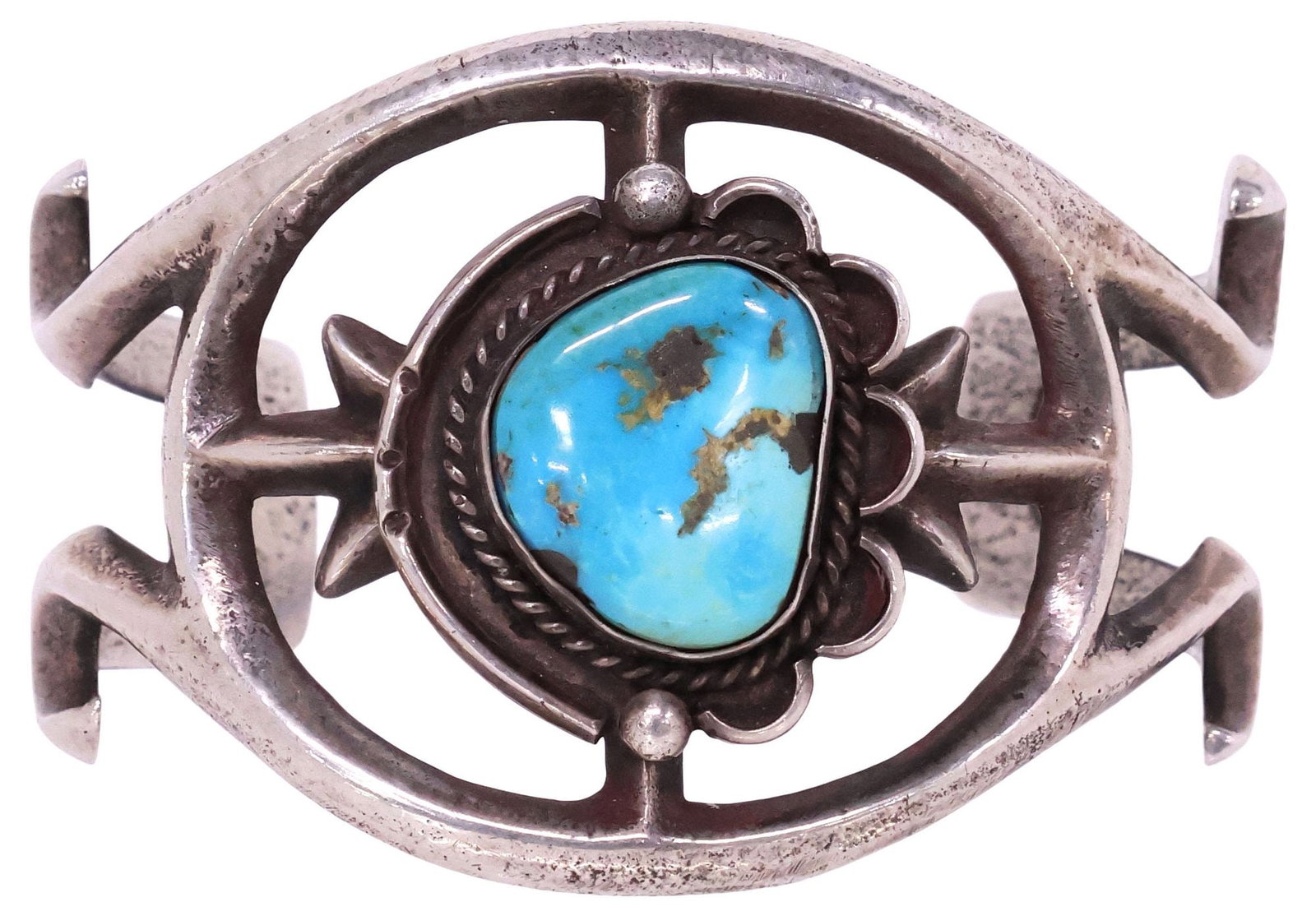 NATIVE AMERICAN SILVER & TURQUOISE CABOCHON CUFF BRACELET: Native American silver (content unknown) cuff bracelet, having central bezel-set turquoise cabochon in braided rope surround, scalloped around one edge, on split shank cuff, unmarked, approx 1 7/8"w,