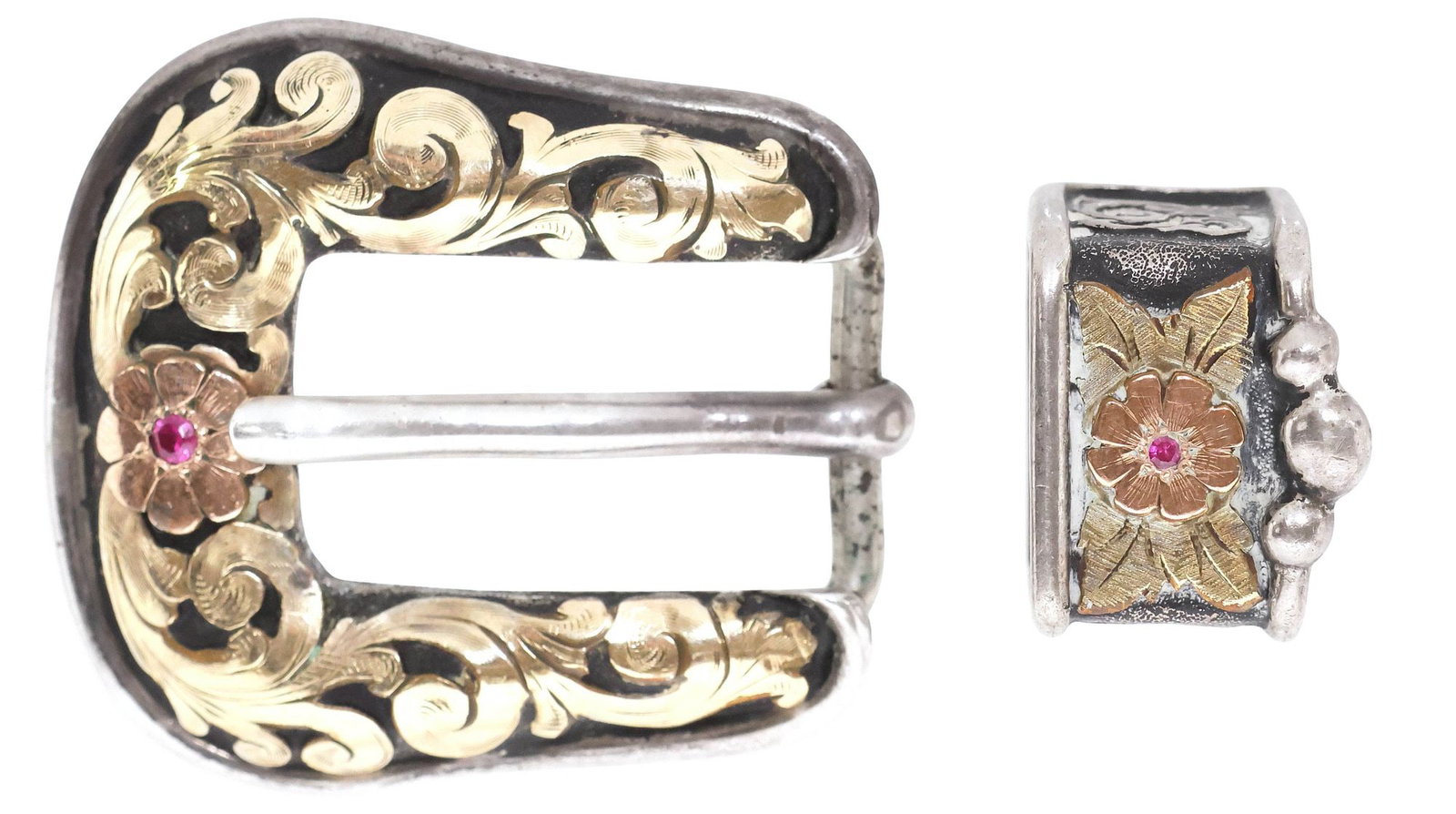 WESTERN BOB BERG STERLING SILVER & GOLD OVERLAY RANGER BUCKLE SET: Western sterling silver two-piece ranger buckle set, Bob Berg, Australia, 20th c. each with 10kt yellow and rose gold overlay, central floral medallion with inset pink gemstone, marked sterling with m