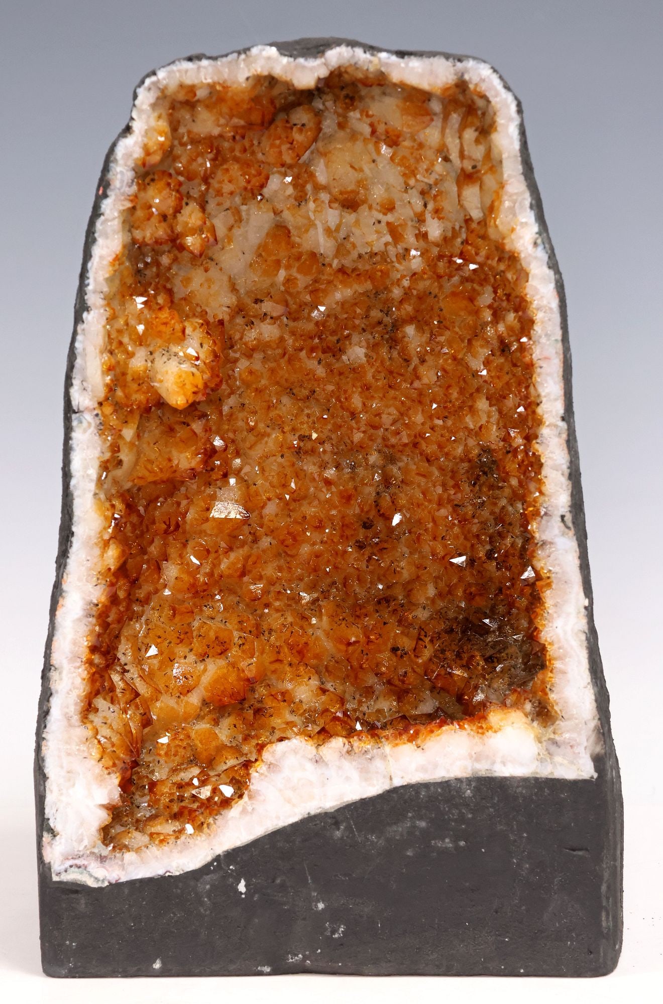 LARGE GEOLOGICAL ORANGE CRYSTAL CATHEDRAL GEODE, 13.5"H: Large crystal cathedral geode, orange in color, possibly citrine or heat-treated amethyst, approx 13.5"h, 8.25"w, 7.25"d, 28.25lbs