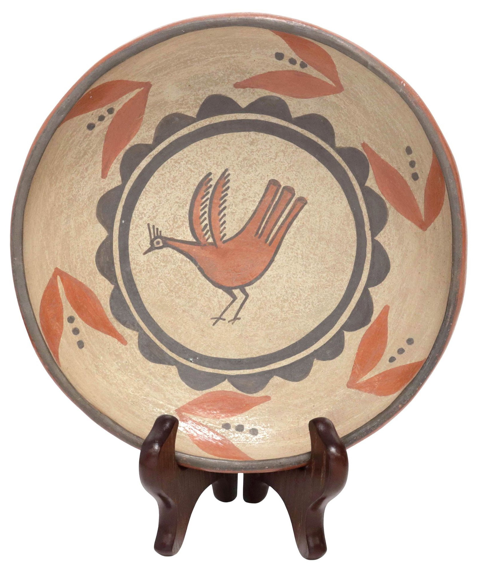 NATIVE AMERICAN ZIA PUEBLO POLYCHROME BIRD POTTERY BOWL & STAND: Native American pottery shallow bowl, Zia Pueblo, New Mexico, slip-decorated interior with bird and foliate motifs, red exterior, accompanied by wood display stand, bowl: approx 8"diam, overall on sta