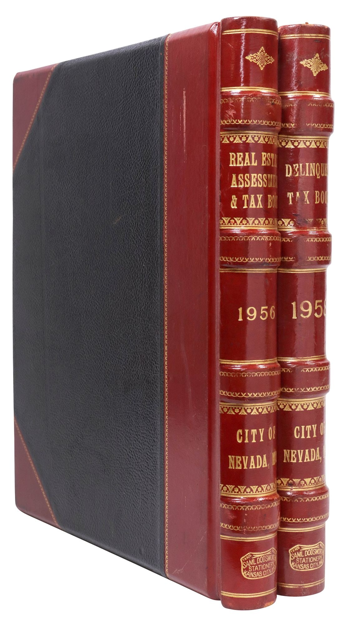(2) VINTAGE LARGE-FORMAT LEATHER-BOUND TAX LEDGER BOOKS: (lot of 2) Large-format ledgers, each manufactured by Saml Dodsworth Stationary Company, Kansas City, with gilt-embossed red and black leather binding, raised spine bands, marbleized page ends, printe