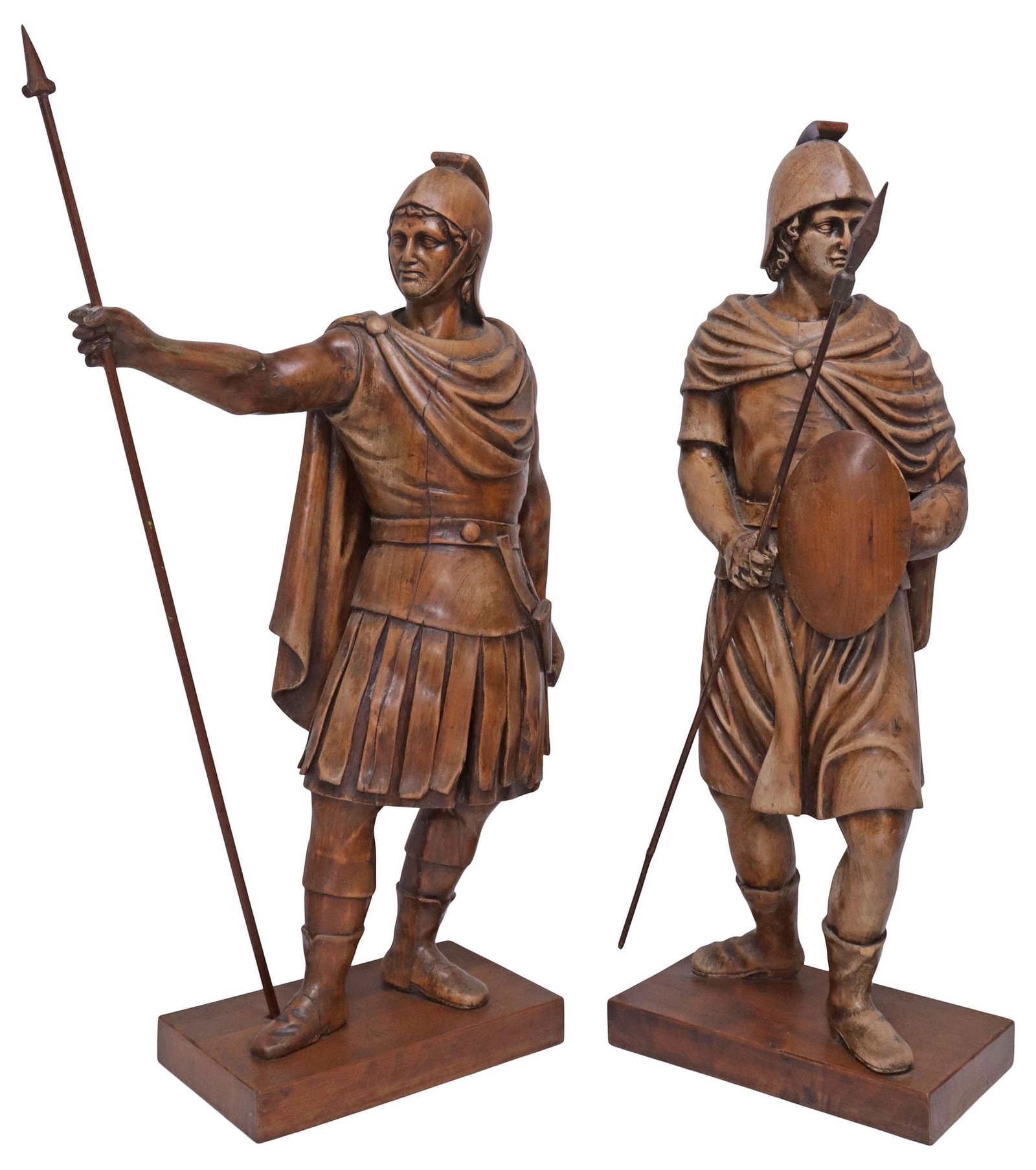 (2) LARGE ITALIAN CARVED WALNUT FIGURAL SCULPTURES, ROMAN SOLDIERS, 26"H: (lot of 2) Italian carved walnut sculptures, Roman Soldiers, 19th c., each figure with spear and helmet, standing atop integral rectangular platform, intact with small glue repairs, one figure lacking