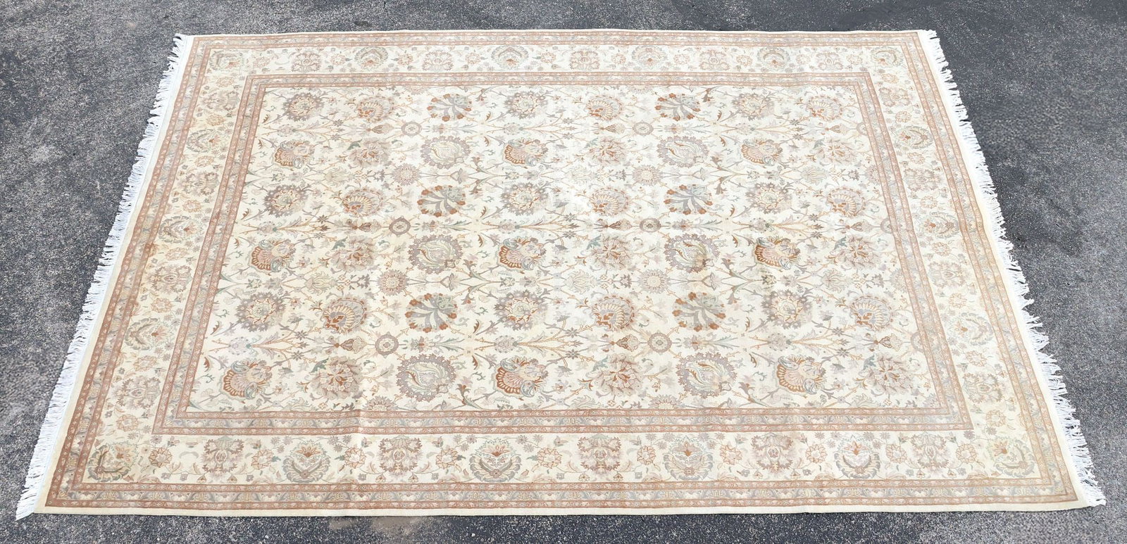 ESTATE HAND-TIED PAKISTANI TABRIZ RUG, 12'5" X 9': Estate hand-tied Tabriz rug, Pakistan, approx 12'5"l, 9'w **Please Note: All of the rugs offered in this auction would likely benefit from a professional cleaning. Estate rugs may show some wear and i