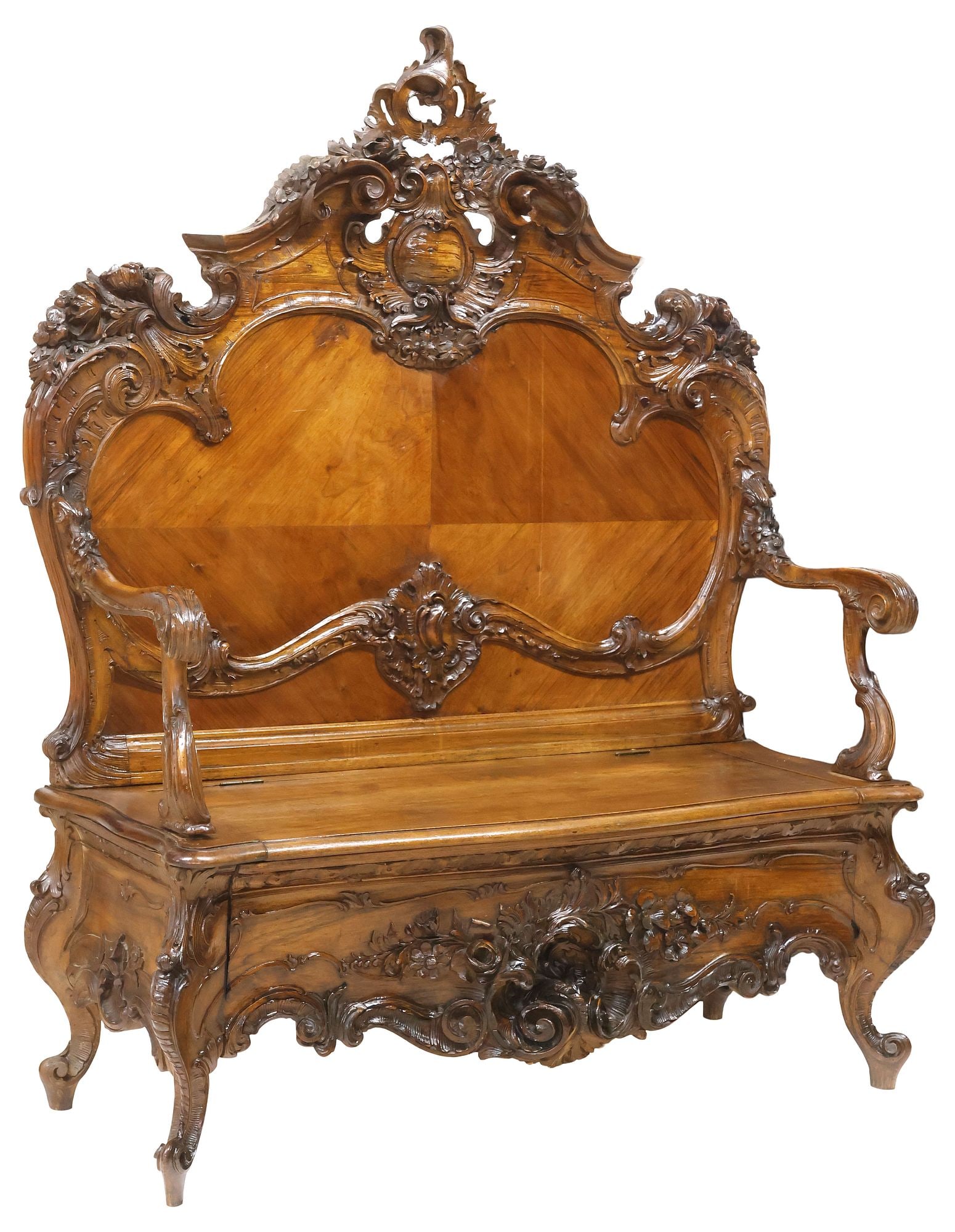 FRENCH LOUIS XV STYLE FINELY CARVED WALNUT HALL BENCH: French Louis XV style walnut hall bench, 19th c., having pierced floral rocaille crest over split pediment, matched veneer back with raised scrolling trim, hinged seat flanked by scroll arms with acan