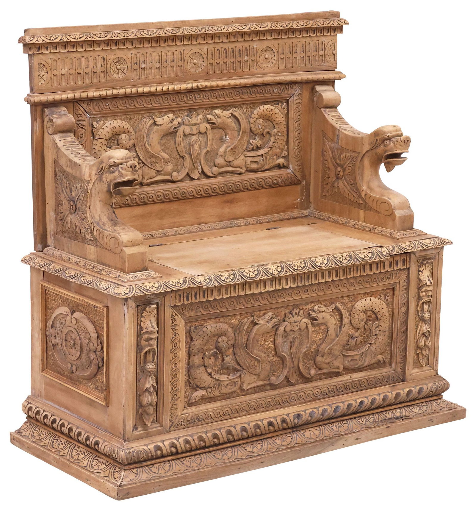 FRENCH RENAISSANCE REVIVAL CARVED & STRIPPED WALNUT HALL BENCH: French Renaissance Revival carved and stripped walnut hall bench, 19th c., having paneled back with floral roundels and egg-and-dart molding, above figural winged grotesques and protruding mask handho