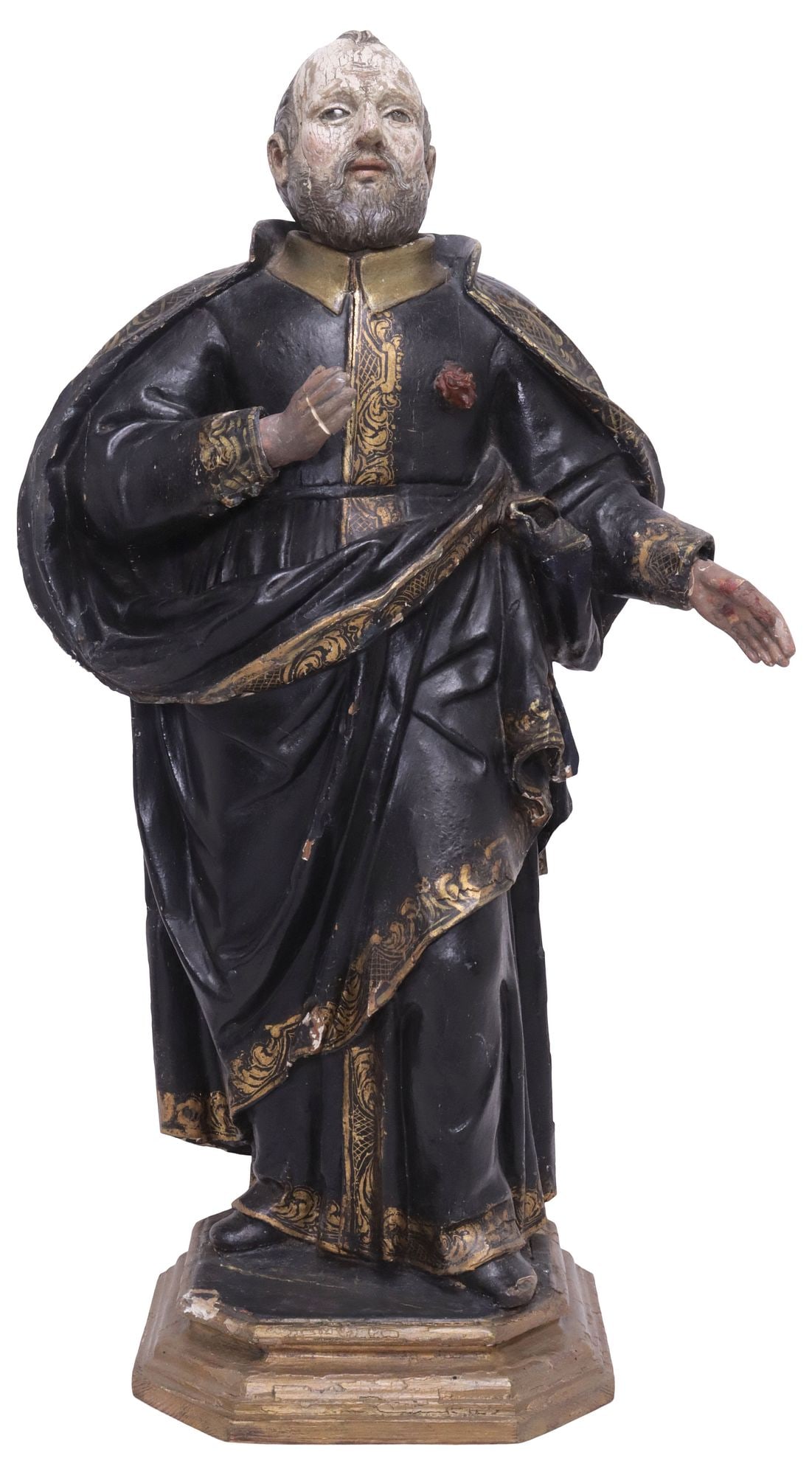 LARGE CONTINENTAL CARVED RELIGIOUS SANTO FIGURE, ST. FRANCIS XAVIER, 19TH C.: Large Continental carved wood religious santo figure, Saint Franciscus Xaverius (Francis Xavier), early 19th c., with inset glass eyes, in black and gold robes with flames bursting from his heart, sta