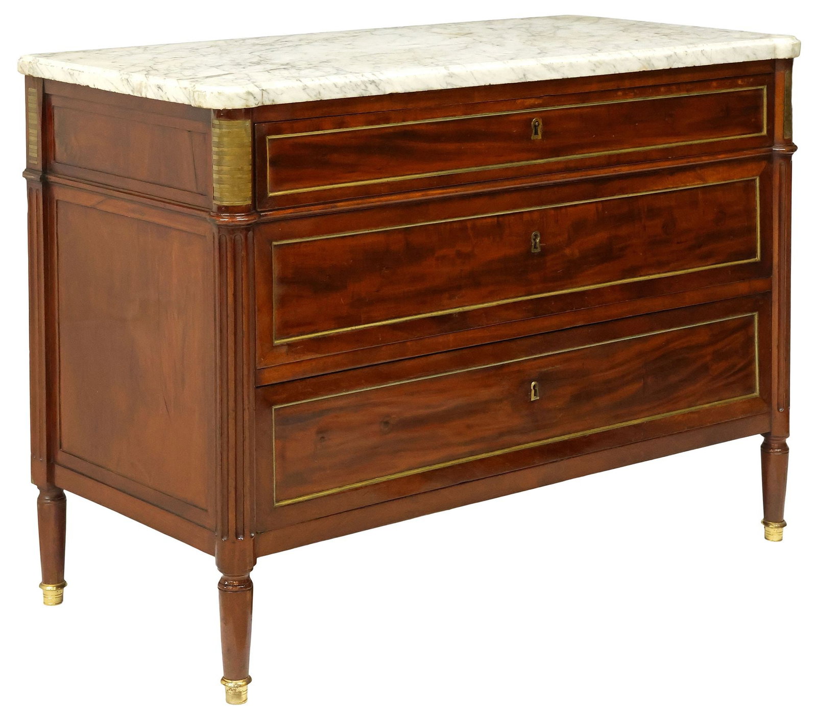 FRENCH LOUIS XVI MARBLE-TOP MAHOGONY COMMODE: French Louis XVI style mahogany commode, 19th c., having shaped marble top, above three graduated drawers with gilt-metal trim, flanked by fluted corner posts, rising on tapering legs and brass cap fe