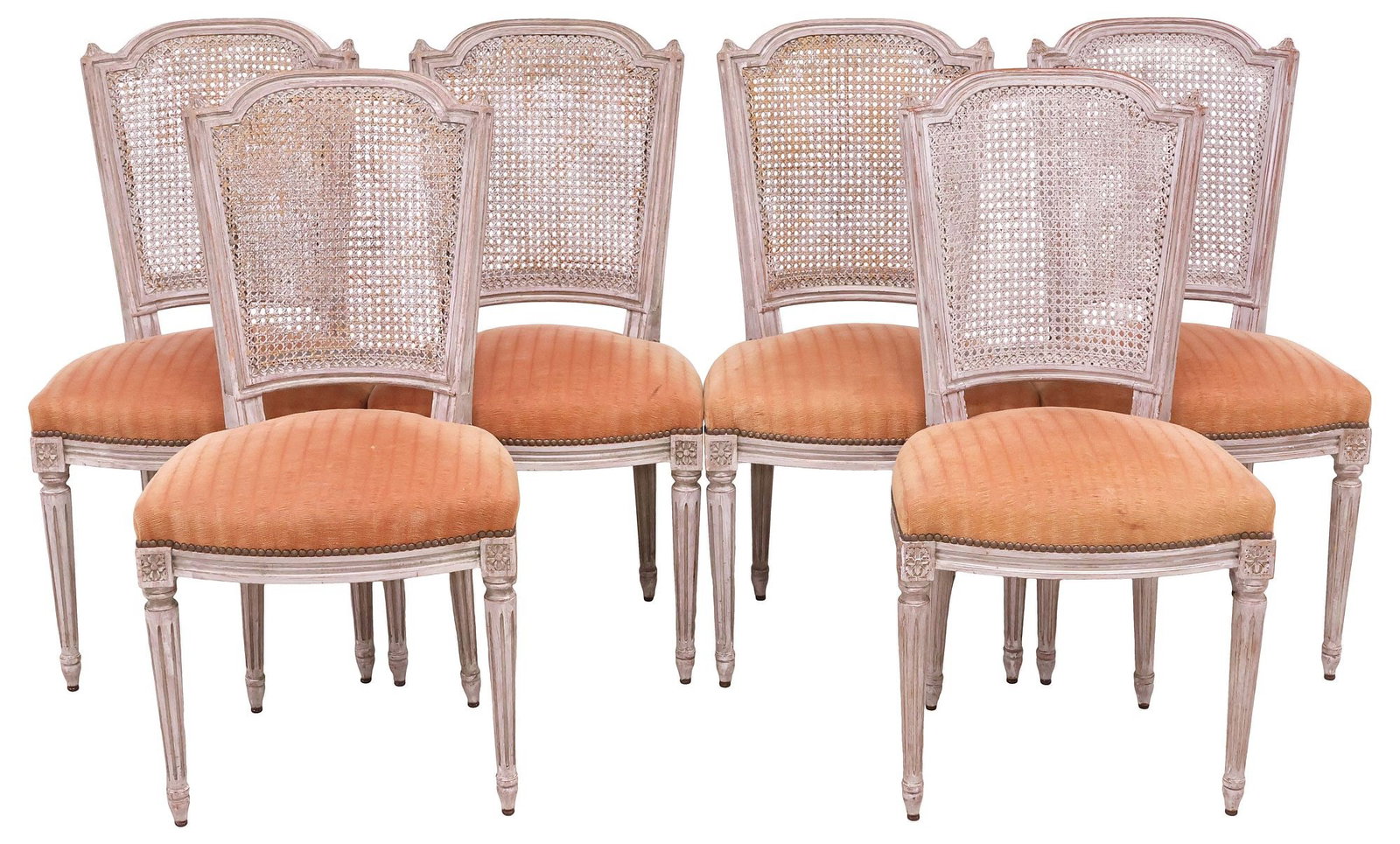 (6) FRENCH LOUIS XVI STYLE CANED & UPHOLSTERED DINING CHAIRS: (lot of 6) French Louis XVI style side chairs, late 19th c., each having caned back and padded seat, in striped fabric upholstery, with nailhead trim, rising on tapering fluted legs, ending on toupie 