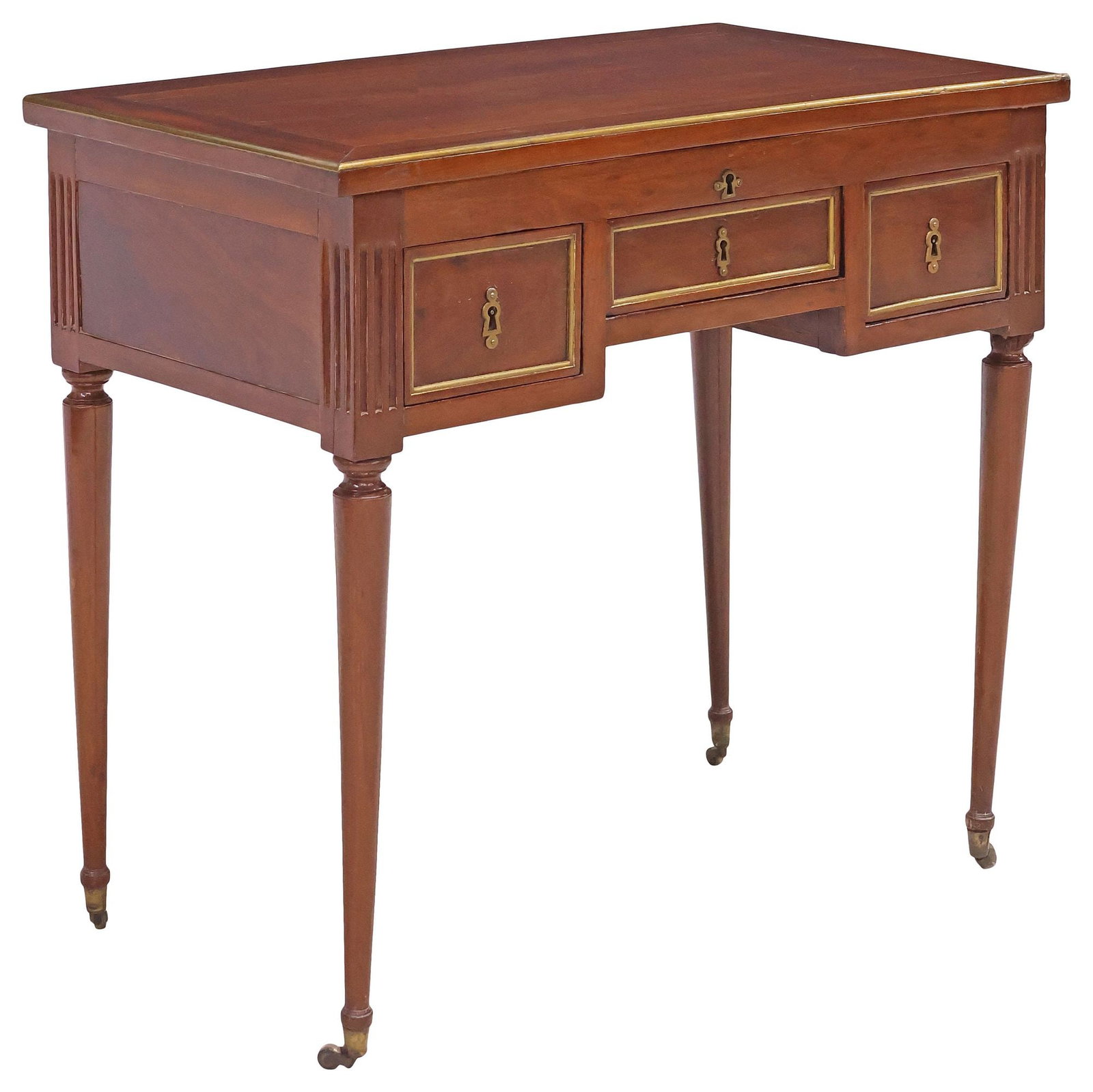 FRENCH LOUIS XVI STYLE PETITE MAHOGANY WRITING DESK / DRESSING TABLE: French Louis XVI style mahogany petite writing desk or dressing table, early 20th c., hinged rectangular top with gilt-metal banded trim, revealing mirrored interior with open storage, above three dra