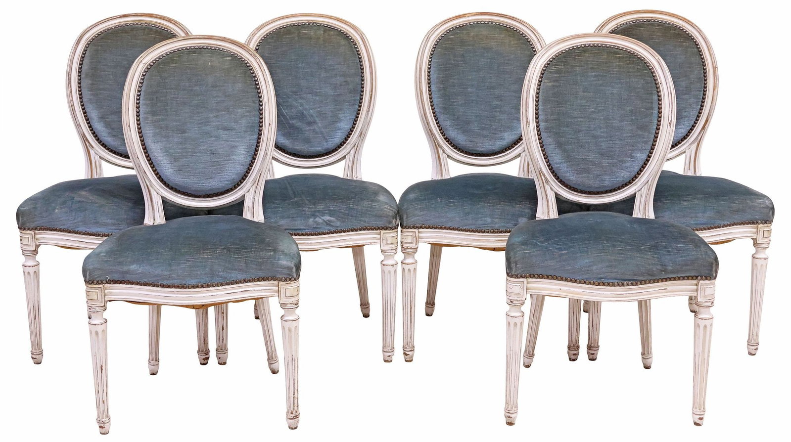 (6) FRENCH LOUIS XVI STYLE UPHOLSTERED & WHITE-PAINTED DINING CHAIRS: (lot of 6) French Louis XVI style side chairs, late 19th c., each with oval medallion back and padded seat in blue fabric upholstery, with nailhead trim, rising on tapering fluted supports, ending on 