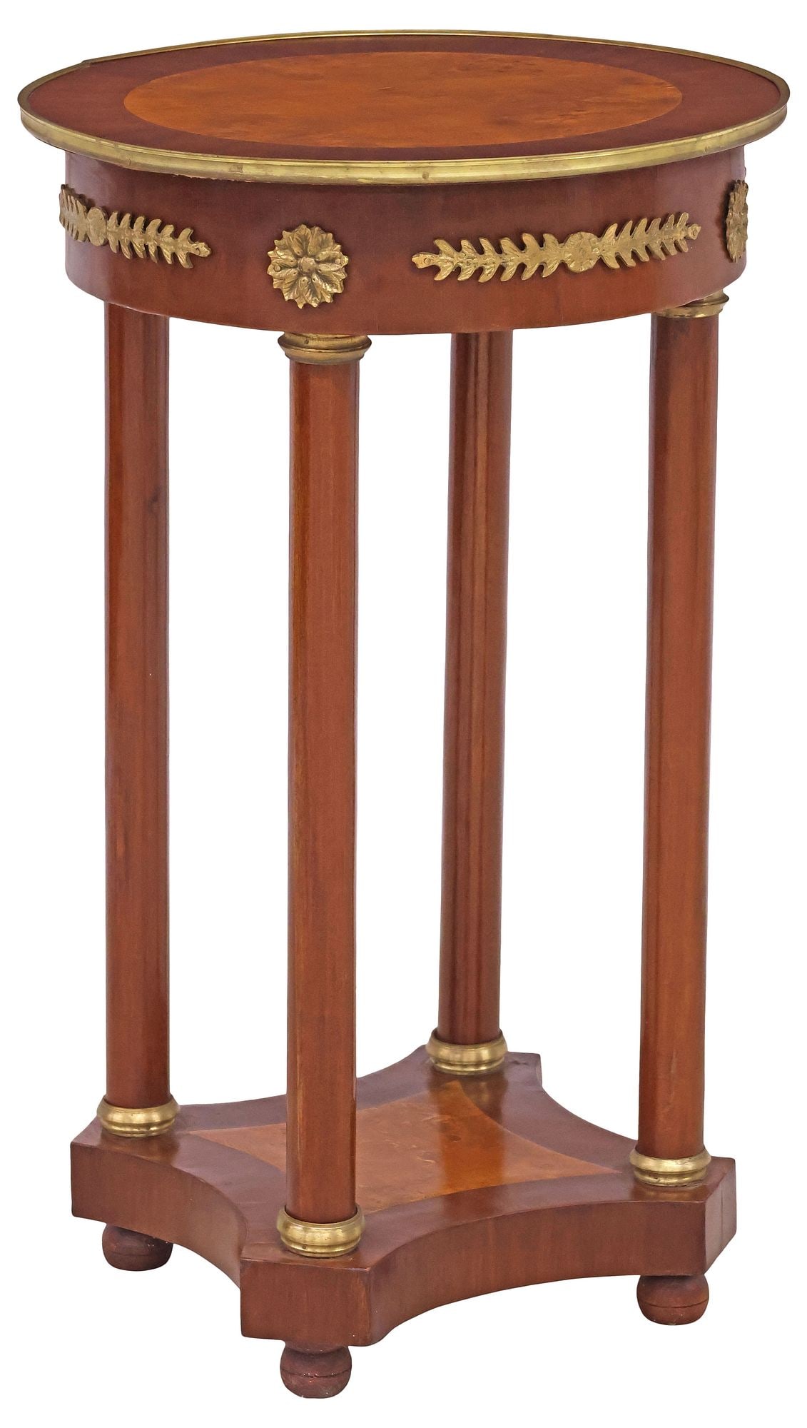 FRENCH EMPIRE STYLE MAHOGANY & GILT-METAL MOUNTED SIDE TABLE / GUERIDON: Empire style mahogany pedestal side table/ gueridon, early 20th c., circular top with inset burlwood center, above apron with gilt-metal mounts, rising on columnar supports, ending on platform base an