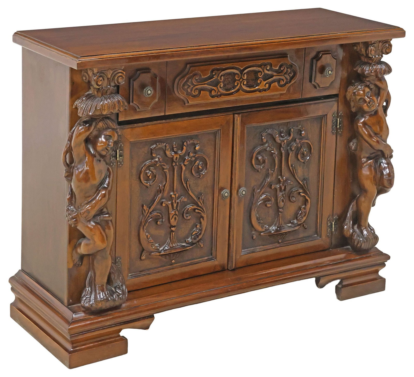 ITALIAN RENAISSANCE STYLE CARVED WALNUT SIDEBOARD / BUFFET: Italian Renaissance style carved walnut sideboard/ buffet, 20th c., having rectangular top, above single drop-front door and two paneled cabinet doors, with foliate scrollwork, flanked by figural cher