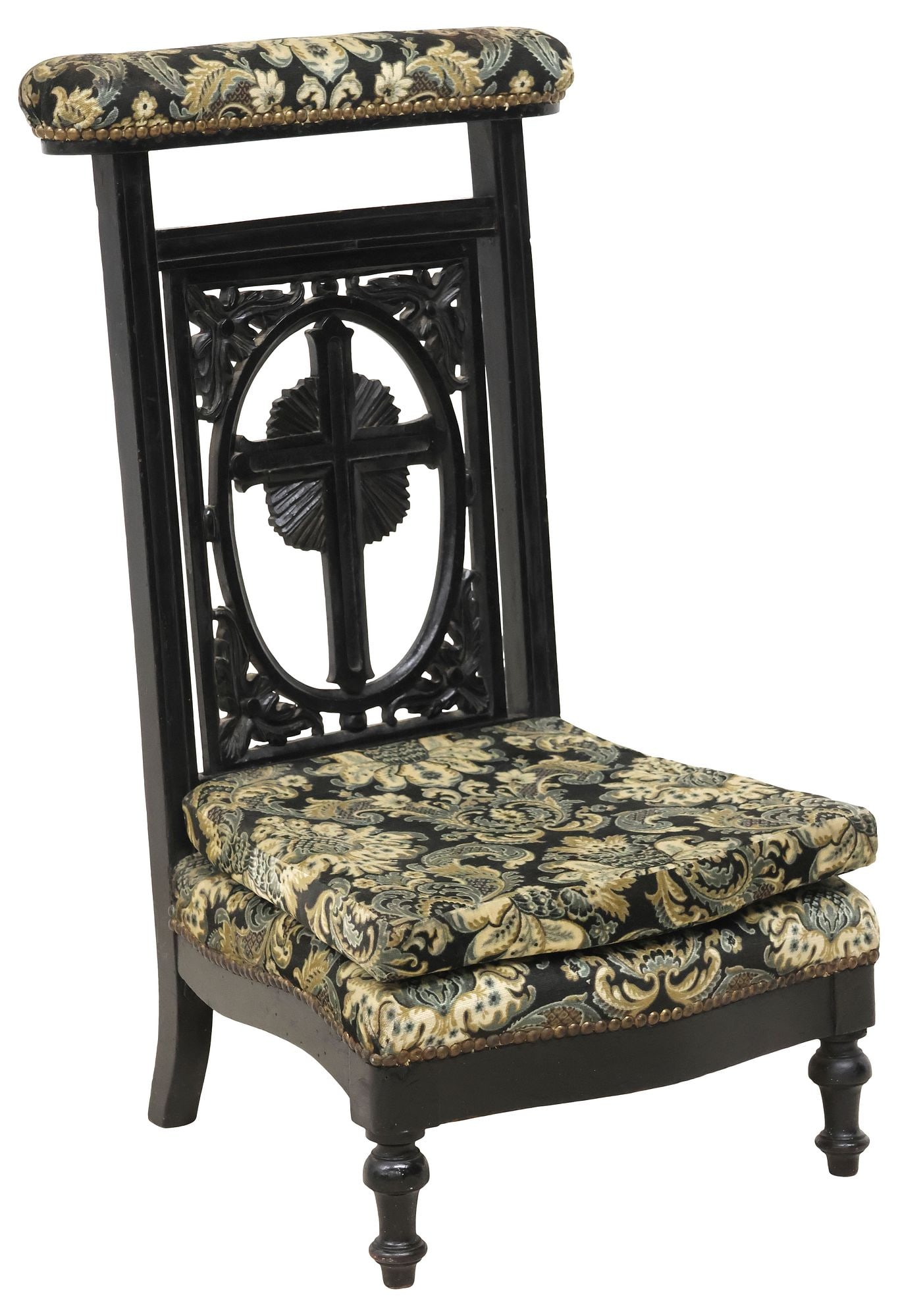 FRENCH EBONIZED & UPHOLSTERED PRIE DIEU / PRAYER KNEELER: French carved and ebonized prie dieu/ prayer kneeler, 19th c., having padded top rail, seat, and removable cushion in later patterned fabric upholstery, with nailhead trim, carved cross splat, rising 