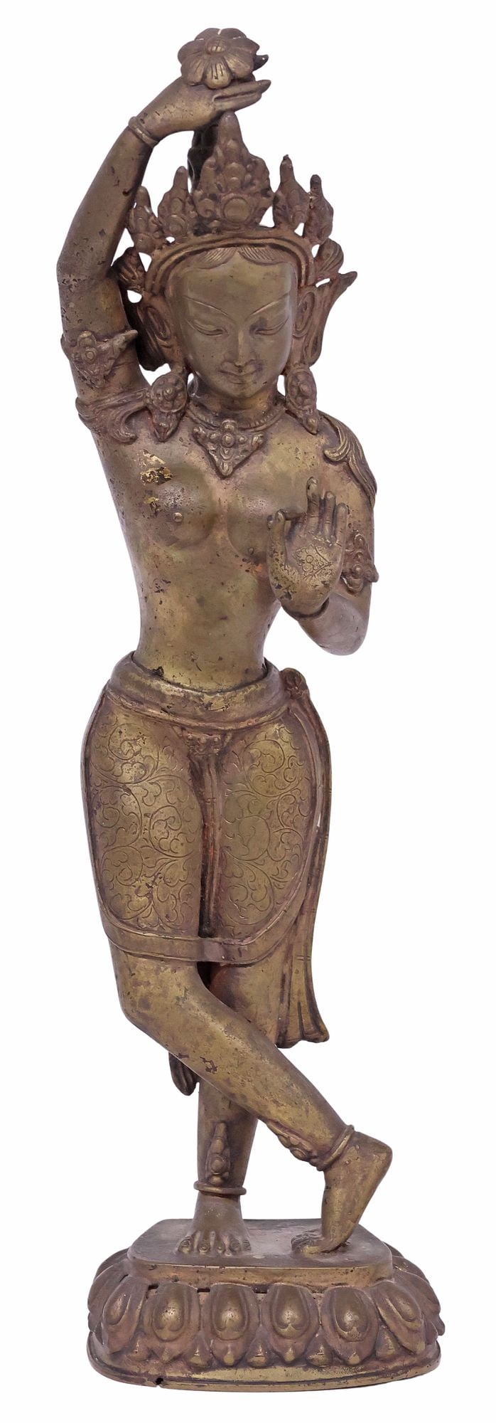 SINO-TIBETAN BRONZE / COPPER ALLOY SCULPTURE OF DANCING TARA: Asian patinated bronze/ copper alloy religious sculpture, Tibet or Nepal, modeled as the dancing figure of Tara (Maya Devi), one hand in the Abhaya mudra, standing atop a lotus base, in a worn gilt fi