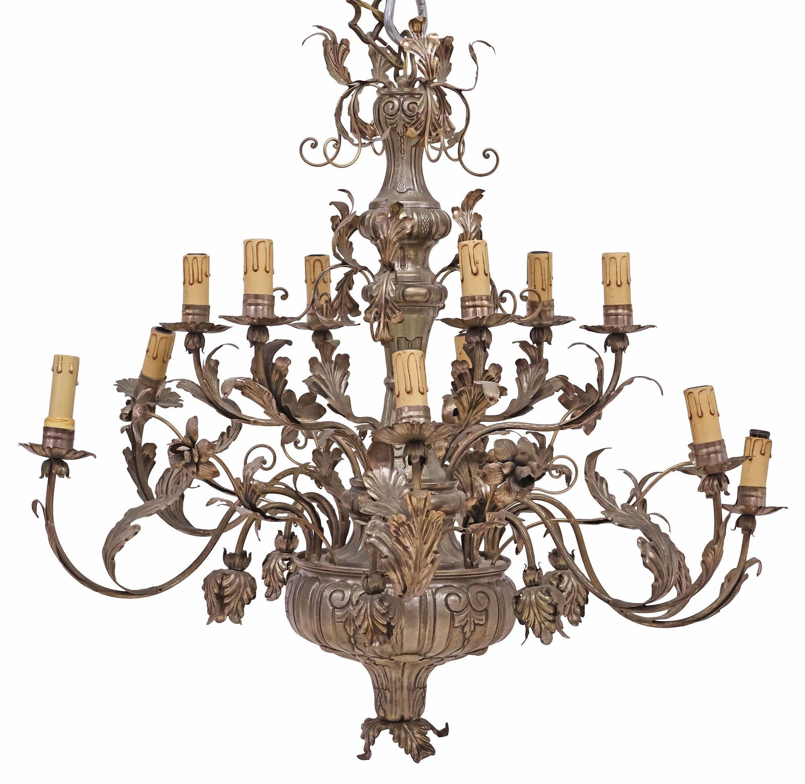 ITALIAN CHASED SILVER-TONE METAL FLORAL 12-LIGHT CHANDELIER: Italian silver-tone metal twelve-light chandelier, 20th c., tiered frame with turned-form standard, issuing ribbed scroll arms with acanthus foliates and floral motifs, ending at floriform bobeche wit