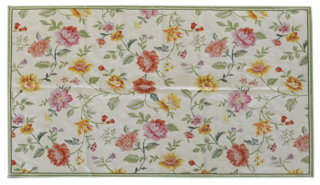 CHINESE NEEDLEPOINT FLORAL MOTIF WOOL RUG: Chinese needlepoint wool rug, a cream ground having polychrome flowering vines, exposed needlework underside, 5'11"l, 3'11"w, 4.75lbs Start Price: $100.00