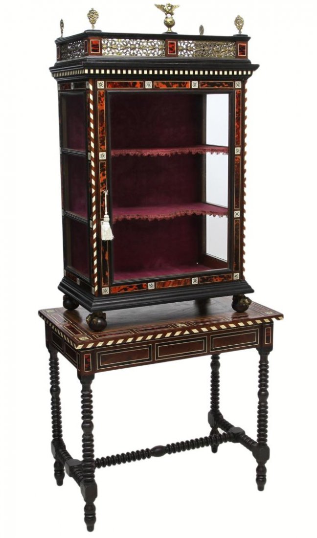 SPANISH INLAID DISPLAY CABINET MID 19TH C.: Ornate display cabinet, Valencia, Spain, mid 19th century, a pierced gilt metal cornice with metal eagle and floral vase finials, over the three glass side cabinet, the front and sides decorated with 