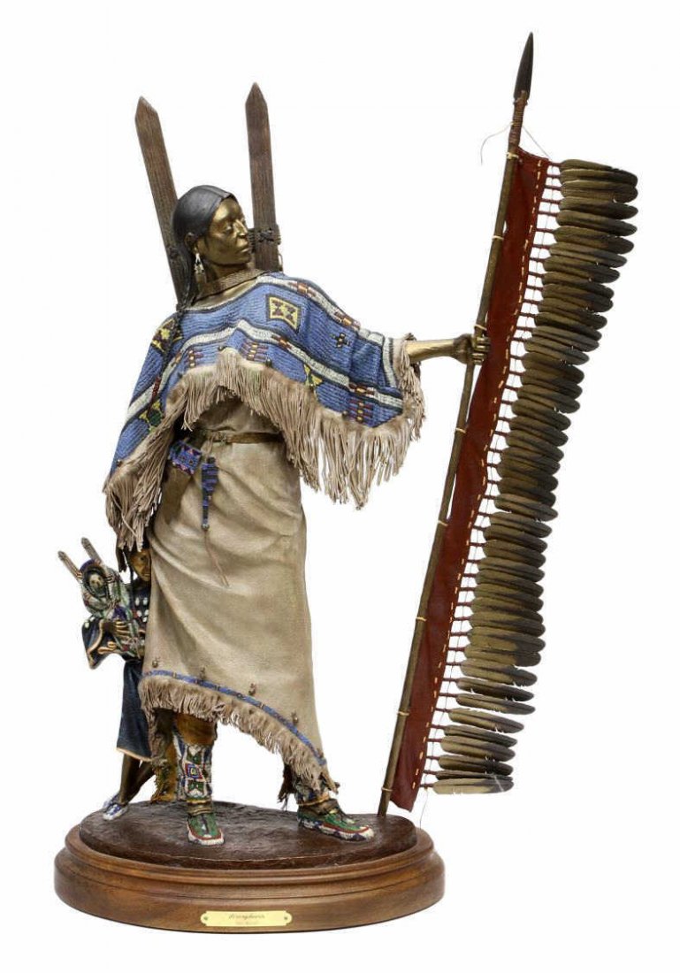 DAVE McGARY "STRONG HEARTS" BRONZE SCULPTURE: Bronze sculpture of a Native American, "Strong Hearts" signed on bronze Dave McGary (Wyoming, New Mexico, b. 1958), #7 in an edition size of 50, bronze: 27"h, 20"w, 6.5"d, rotating wood stand: 2"h, 13