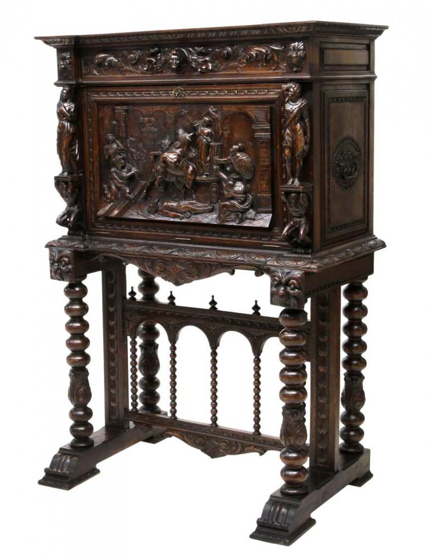 ANTIQUE SPANISH VARGUENO FIGURAL CARVED CABINET: Spanish Renaissance style walnut vargueno on stand, Barcelona, 19th c., the fall front centering a figural and horse Roman scene flanked by standing figures, the interior with a six drawer gallery, re