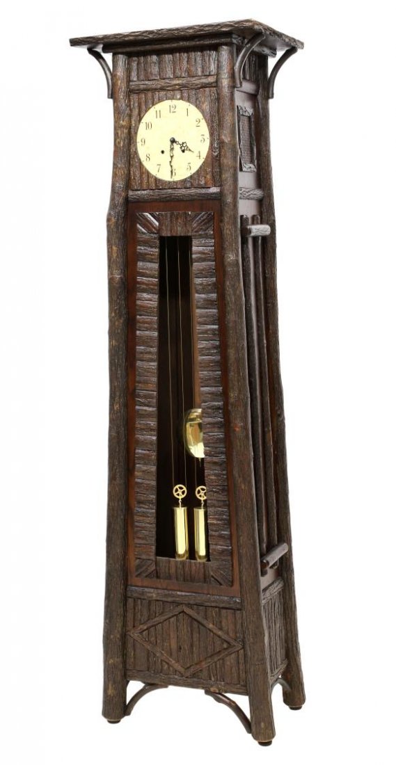 OLD HICKORY BIG RANCH GRANDFATHER CLOCK: Old Hickory Big Ranch grandfather clock , 20th c., the trapezoid form with tree limb like decoration housing the time and strike double weight driven works by Kieninger, Germany, 90.5"h, 24"w, 15.5"d 