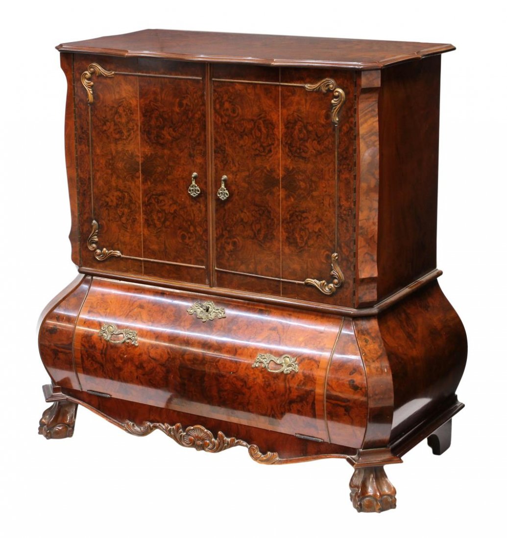 FRENCH STYLE BOMBE TV CABINET: French style burlwood bombe television cabinet, late 20th c., two double hinged upper doors opening th the 21"h, 31"w, 13"d interior, a lower drop front drawer, all rising on short ball and claw feet,