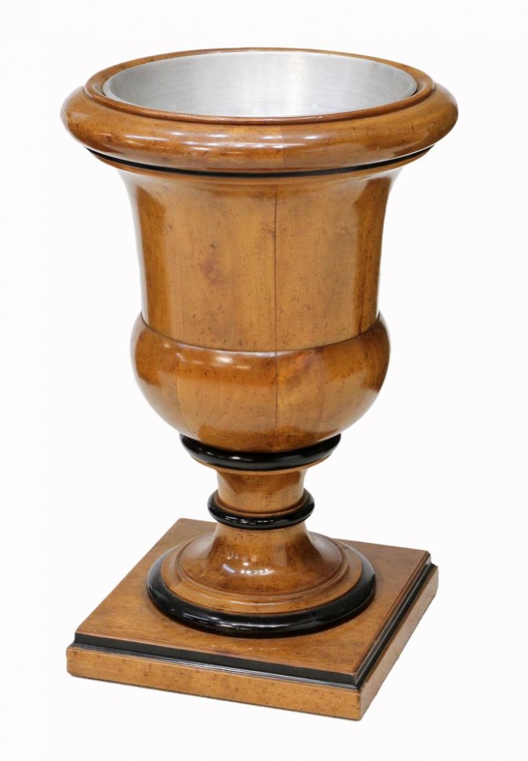 LARGE CAMPANA FORM WOOD PLANTER, SPAIN: Campana form wood urn, Spain, 20th c., ebonized accents, removable metal liner rising on a square base, 23"h, 14.5"d Start Price: $100.00