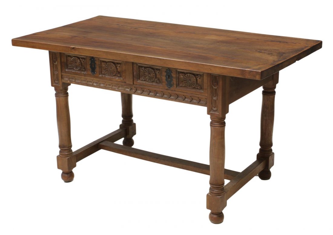 ANTIQUE SPANISH LIBRARY TABLE / DESK: Spanish library or hall table, Northern Spain, 19th c., a rectangular two board top with two carved frieze drawers, rising on stretcher joined turned legs, 30.75"h, 55.25"w, 29"d Start Price: $300.00