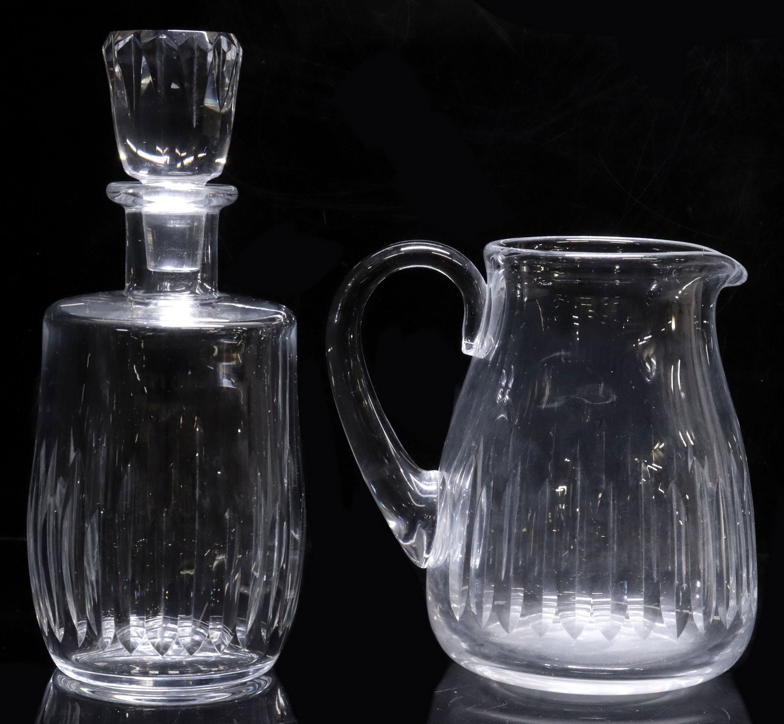 (2) BACCARAT 'LORRAINE' CUT CRYSTAL PITCHER & DECANTER: (lot of 2) French Baccarat cut crystal drinkware, in the "Lorraine" pattern, with acid-etched maker's mark underfoot, including: (1) pitcher, 36-ounce capacity, approx 6.5"h, 6.25"w, 5"d; (1) decanter
