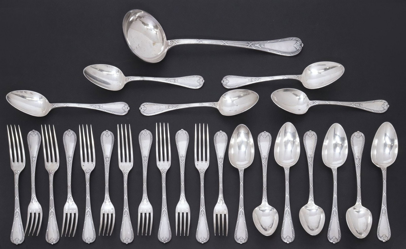 (24) CHRISTOFLE 'RUBANS ET CLOCHETTES' SILVERPLATE FLATWARE SERVICE: (lot of 24) French silverplate flatware set, Orfevrerie Christofle, in the "Rubans et Clochettes" pattern, each with foliates and ribbon motifs, maker's mark, including: (11) forks, appr