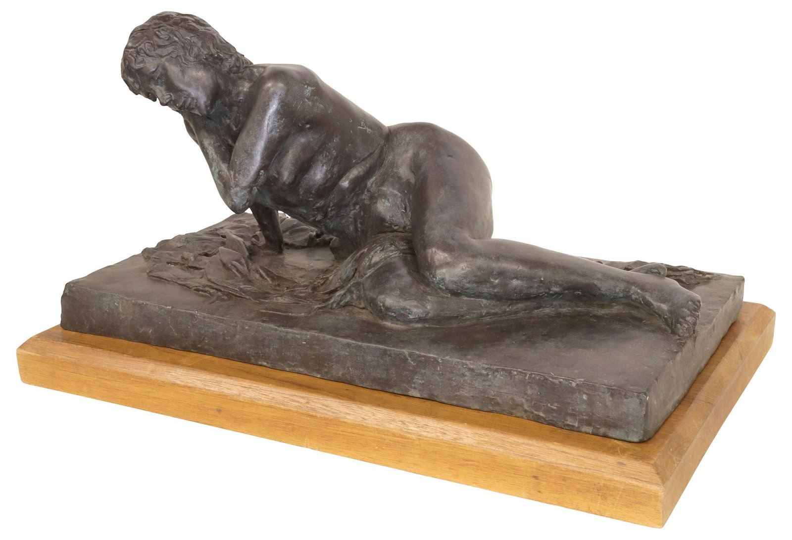 PATINATED BRONZE SCULPTURE ON WOOD BASE, RECLINING FEMALE NUDE: Patinated bronze sculpture, Recumbent Female Nude, signed in cast Zoe, dated Feb. 1990 in cast, rising on rectangular wood stand, bronze only: approx 11.5"h, 22.25"w, 11.5"d, overall: approx 13.25"h, 