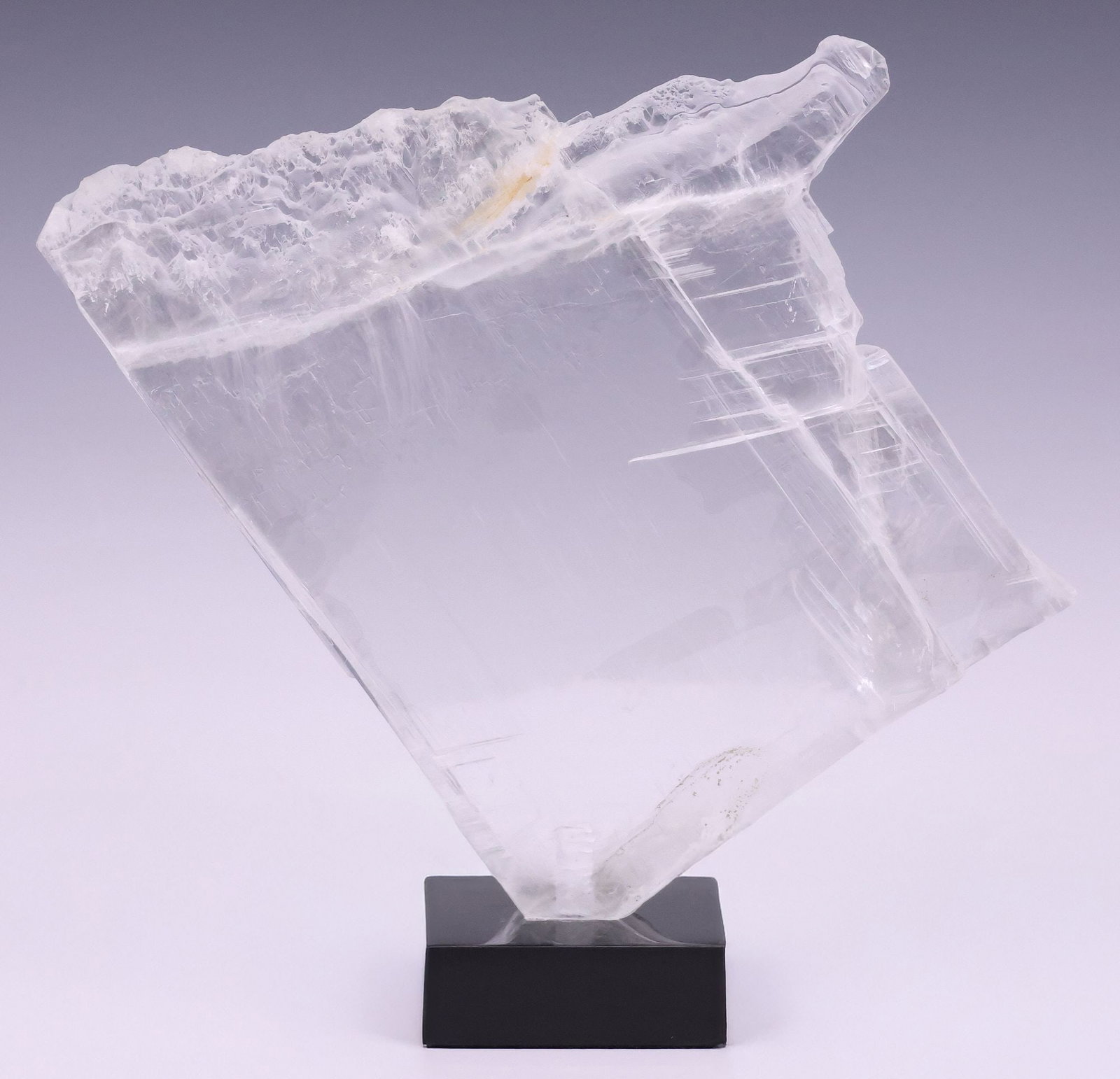 GEOLOGICAL WINDOWPANE SELENITE SPECIMEN ON BLACK MARBLE BASE: Geological windowpane selenite specimen, on black marble base, specimen: approx 9.5"h, 11"w, 1"d, overall: approx 10.5"h, 11"w, 3.25"d, 4.5lbs