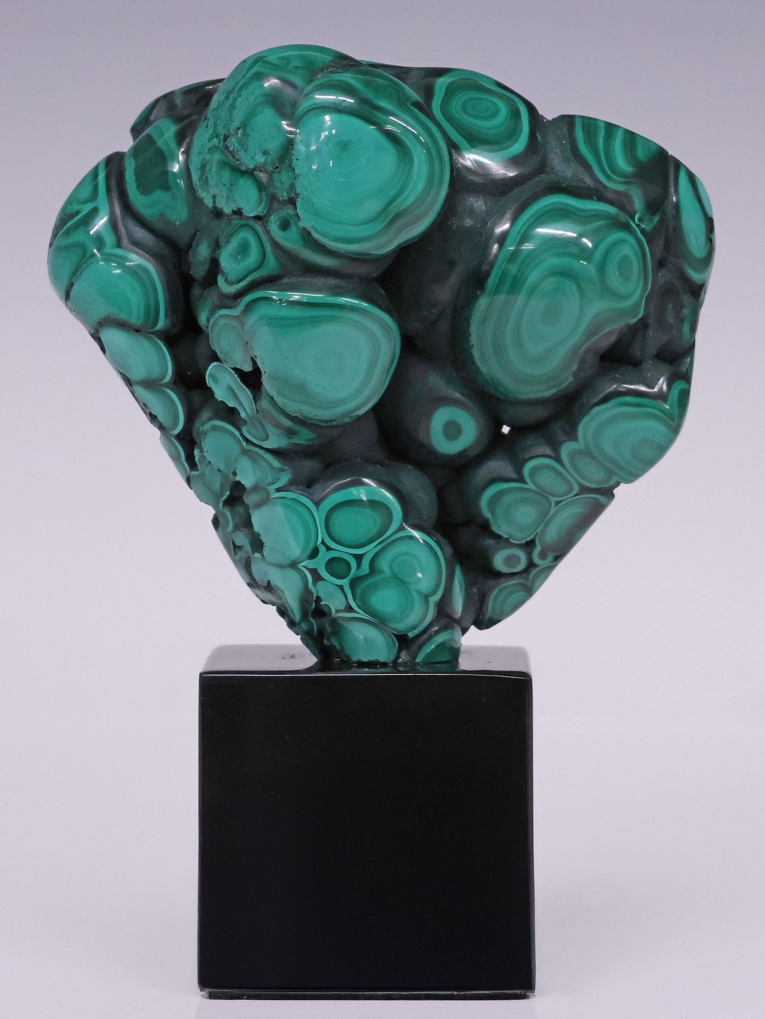 GEOLOGICAL FREEFORM MALACHITE SPECIMEN ON BLACK MARBLE BASE (1 of 3)