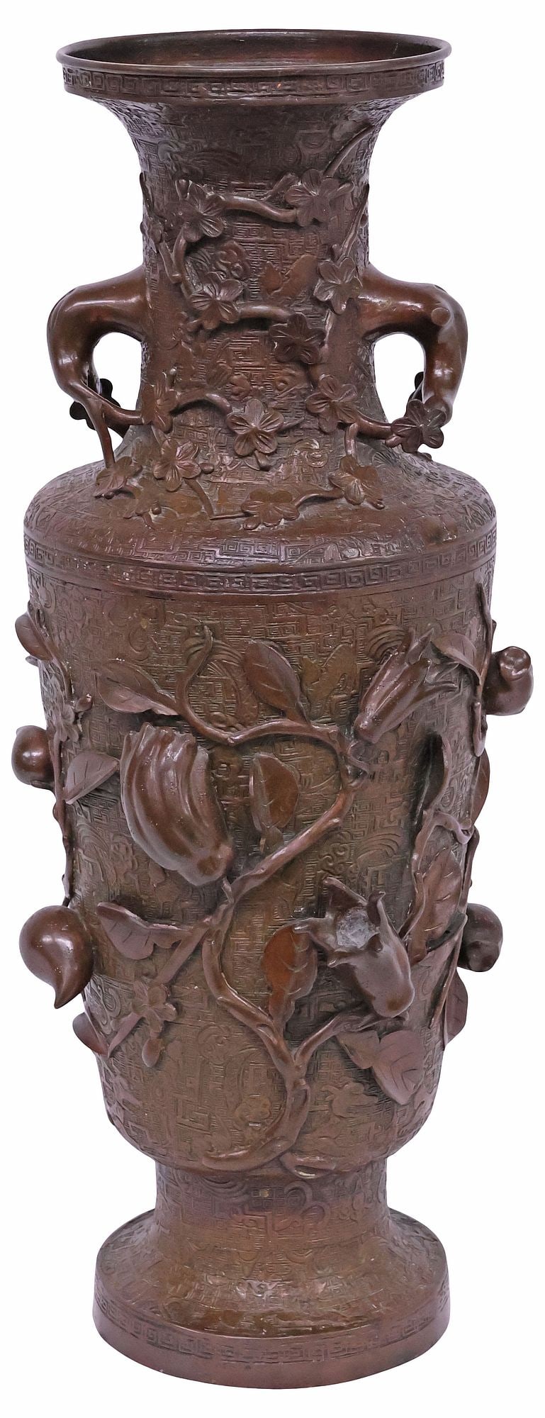 LARGE JAPANESE PATINATED BRONZE 'AUSPICIOUS FRUIT' RELIEF VASE, 22.25"H: Large Japanese patinated bronze vase, textured ground in an all-over meander pattern, branch-form handles issuing peach blossoms twined around the neck, the body with archaistic animal and beast mask