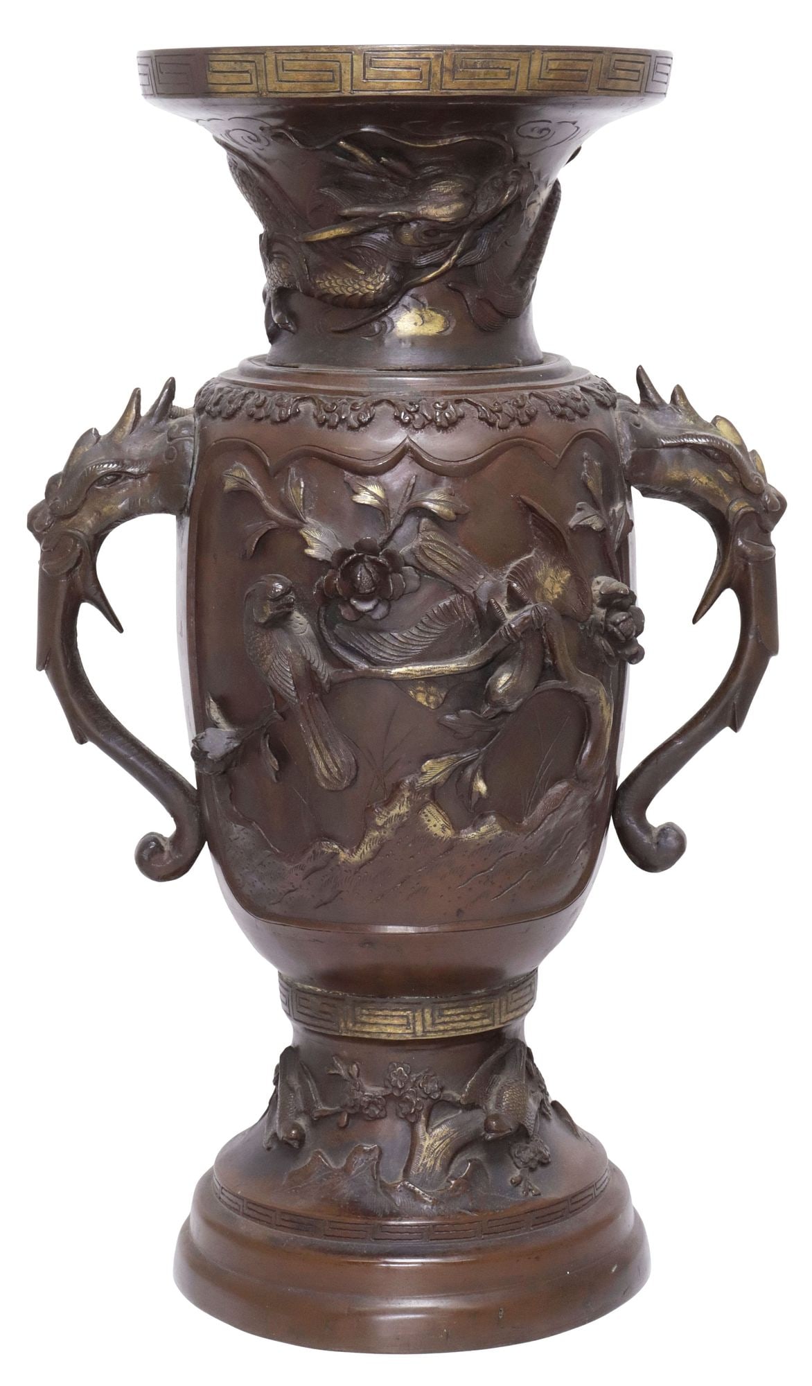 JAPANESE PATINATED BRONZE RELIEF VASE WITH DRAGONS & BIRDS: Japanese patinated bronze vase, having meander-patterned flared rim, over baluster-form body with recessed cartouches of pairs of birds in relief, flanked by scrolled dragon mask handles, on stepped