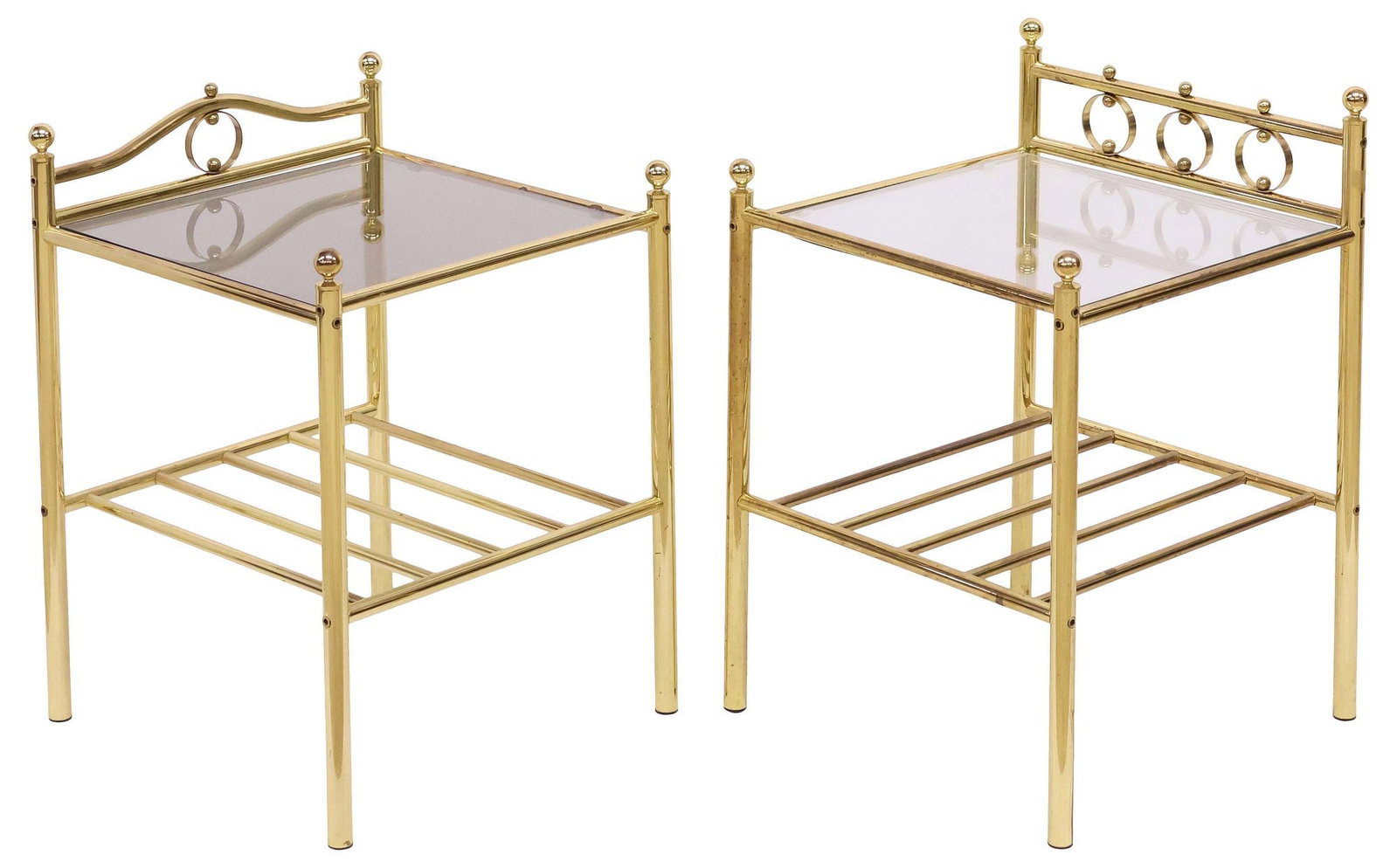 (2) HOLLYWOOD REGENCY STYLE GLASS-TOP BRASS NIGHTSTANDS / SIDE TABLES: (pair) Hollywood Regency style brass nightstands or side tables, 20th c., a near pair, each with cylindrical supports joined by slatted medial shelf, (1) having rectangular smoked glass top, (1) with