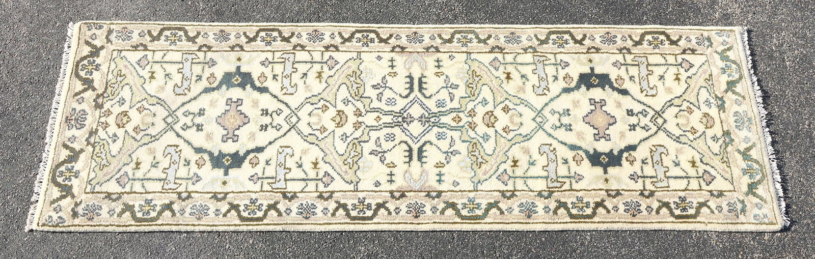 ESTATE HAND-TIED OUSHAK RUG, 7'11" X 2'6.5": Estate hand-tied Oushak rug, approx 7'11"l, 2'6.5"w **Please Note: All of the rugs offered in this auction would likely benefit from a professional cleaning. Estate rugs may show some wear and imperfe