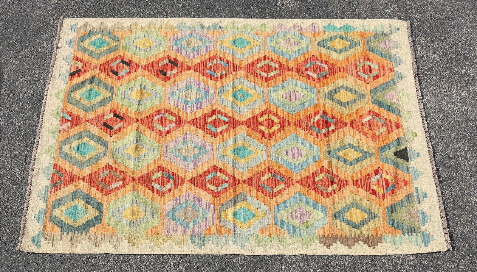 ESTATE FLATWOVEN KILIM RUG, 6'1.5" X 3'11.75": Estate flatwoven Kilim rug, approx 6'1.5"l, 3'11.75"w **Please Note: All of the rugs offered in this auction would likely benefit from a professional cleaning. Estate rugs may show some wear and imper