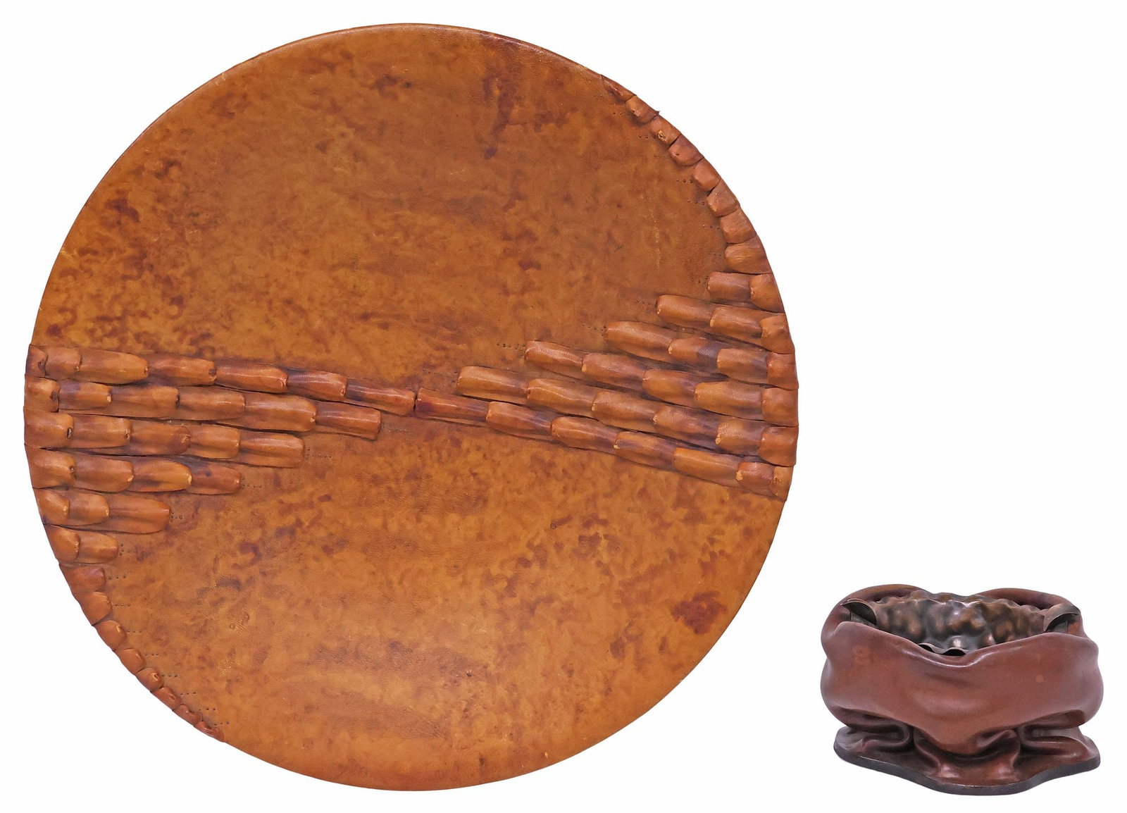 (2) BROWN LEATHER-CLAD CENTERPIECE BOWL & ITALIAN LARS ASHTRAY: (lot of 2) Brown leather-clad table ornaments, including: (1) centerpiece bowl, with overlapping tiles forming abstract design, unmarked, approx 17.5"diam; (1) ashtray, having patinated metal basin wi