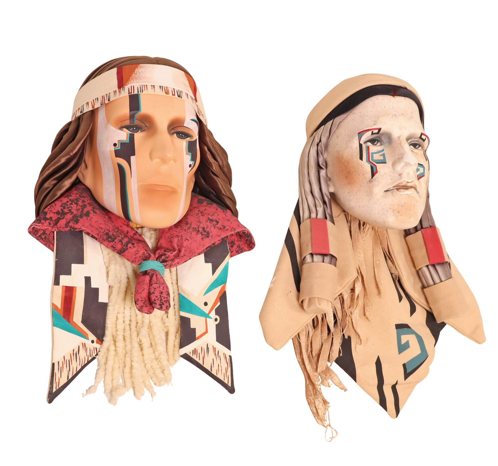 (2) DYAN NELSON (ATTRIB.) CERAMIC WALL-HANGING NATIVE AMERICAN MASKS: (lot of 2) Mixed media wall-hanging masks, attributed to Dyan Nelson (20th c.), each depicting a Native American male figure, with hand-painted ceramic head, applied satin hair and cotton neck ware, a